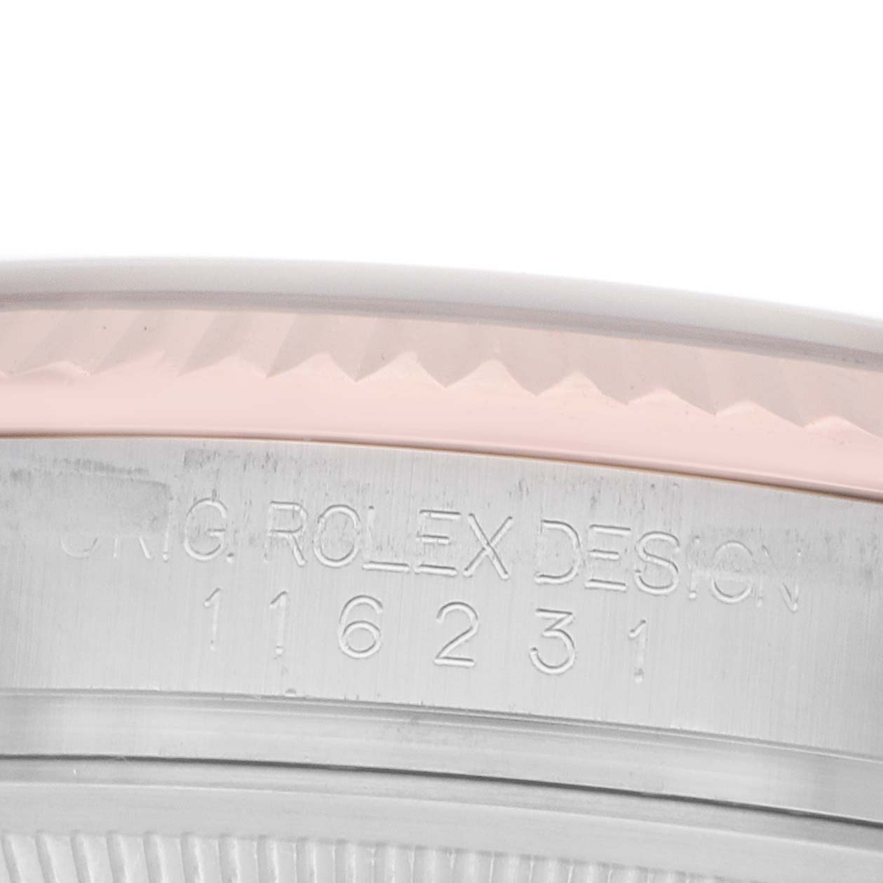 The image shows a close-up of the side of a Rolex Datejust 116231 Men
s Steel and Gold (two tone) White Dial watch, highlighting the model number engraving.