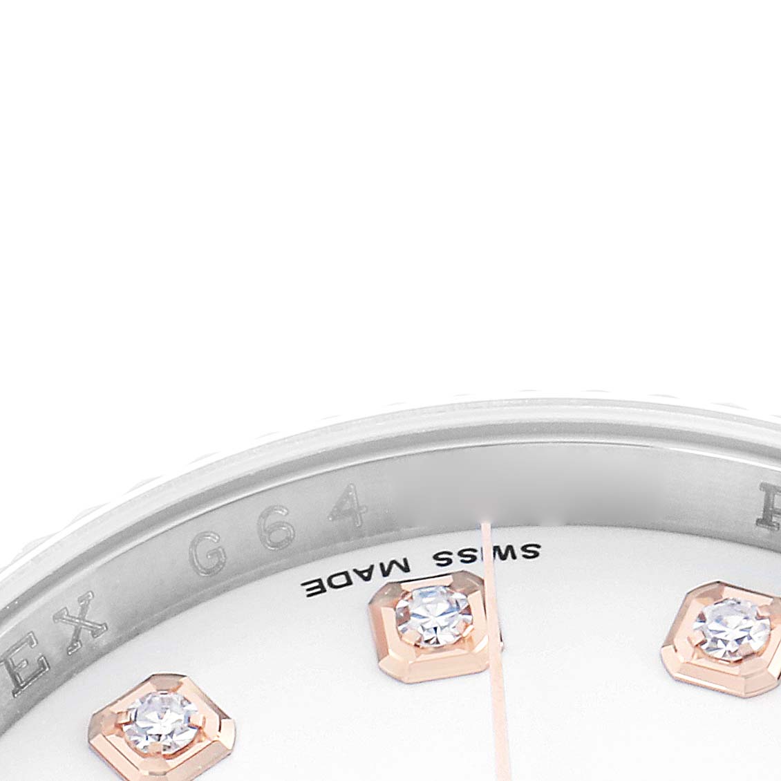 The image shows a close-up of the dial edge of a Rolex Datejust 116231 Men
s Steel and Gold (two tone) White Dial, featuring diamond indices and partial view of the bezel.