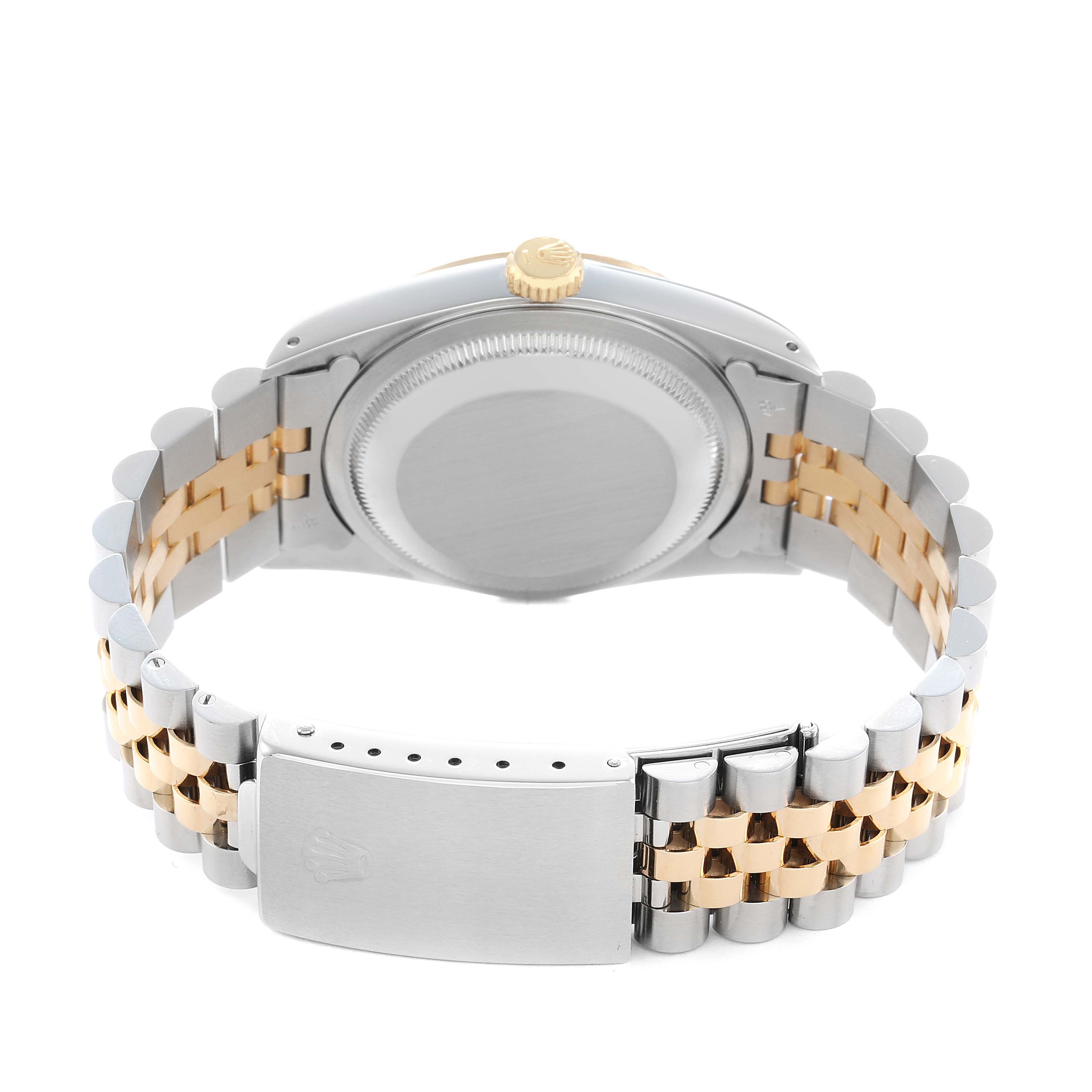 The Rolex Datejust 16233 Men
s Steel and Gold (two tone) Champagne Dial watch is shown from the back, highlighting the caseback, gold crown, and two-tone bracelet clasp.