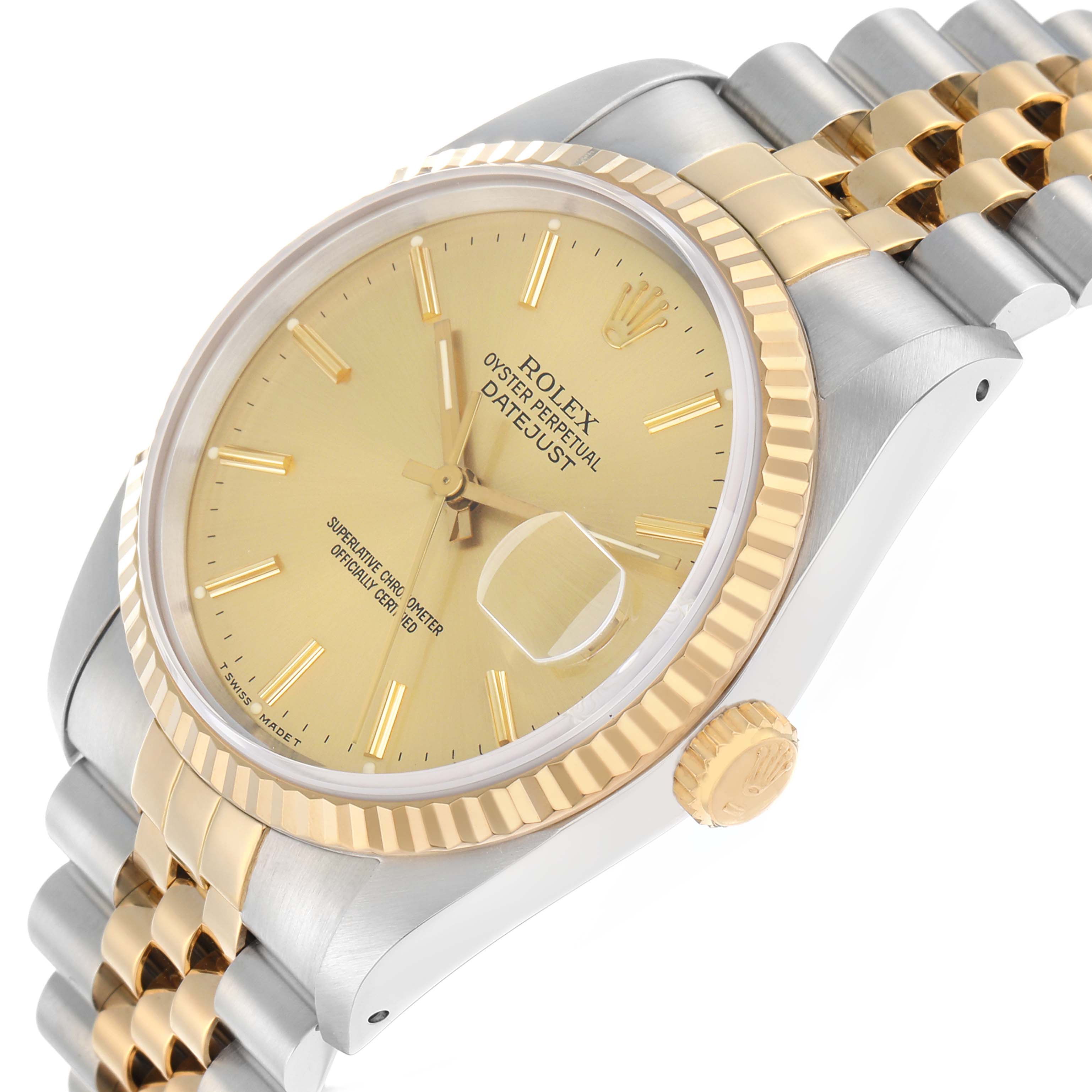 The Rolex Datejust 16233 Men
s Steel and Gold (two tone) Champagne Dial watch is shown at a side angle, highlighting the gold and silver bracelet, bezel, and crown.