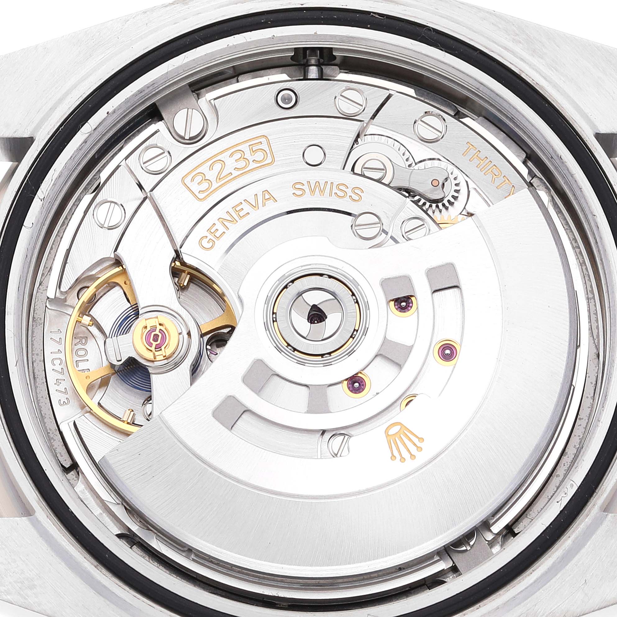 This image shows the movement mechanism of a Rolex Datejust 41 126334 Men
s Stainless Steel Grey Dial 126334 Men
s Stainless Steel Grey Dial watch from a close-up, rear angle.