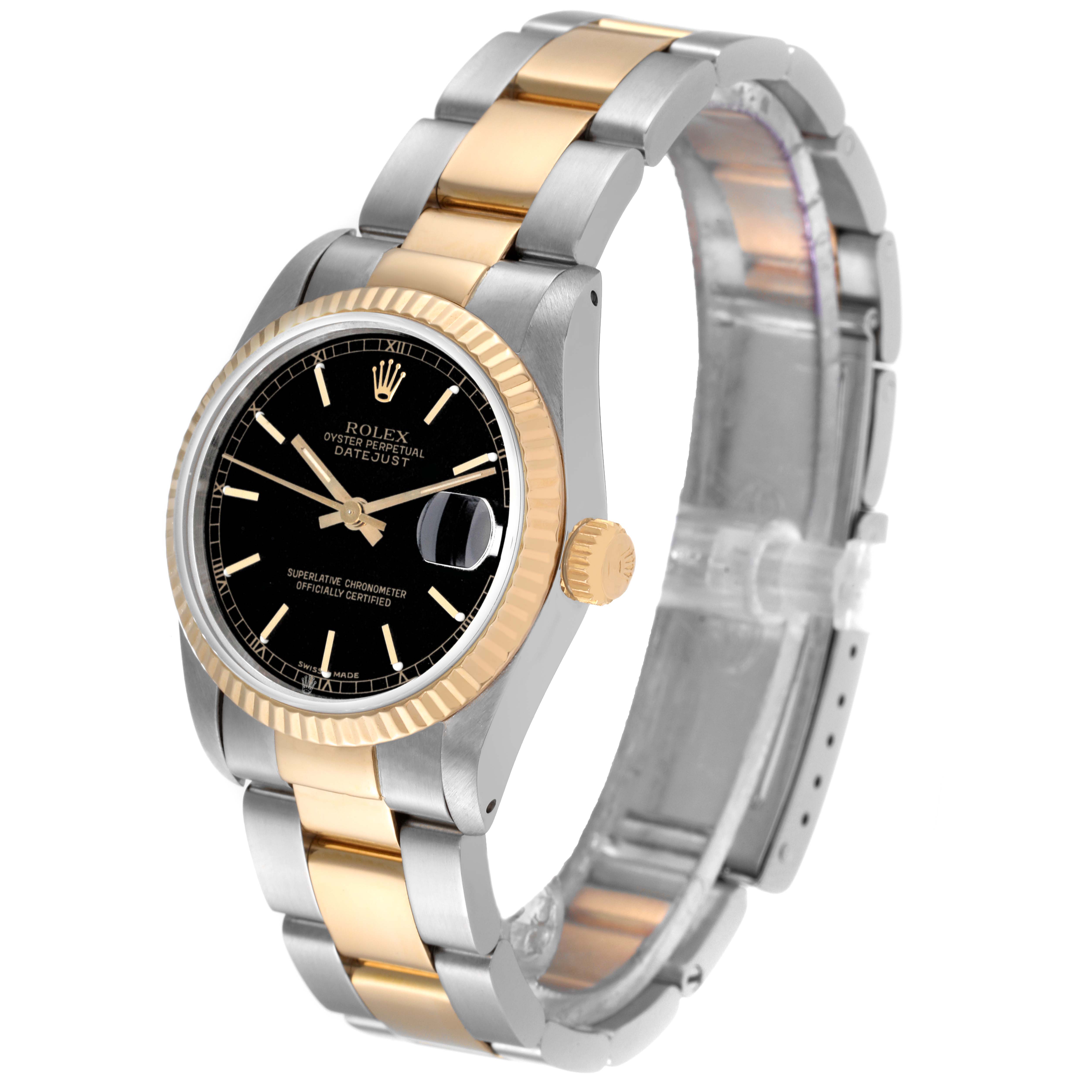 The Rolex Mid-Size 68273 Women's Steel and Gold (two tone) Black Dial 68273 Women's Steel and Gold (two tone) Black Dial model watch is shown from an angled view, highlighting its two-tone stainless steel and gold bracelet, black dial, and fluted bezel.