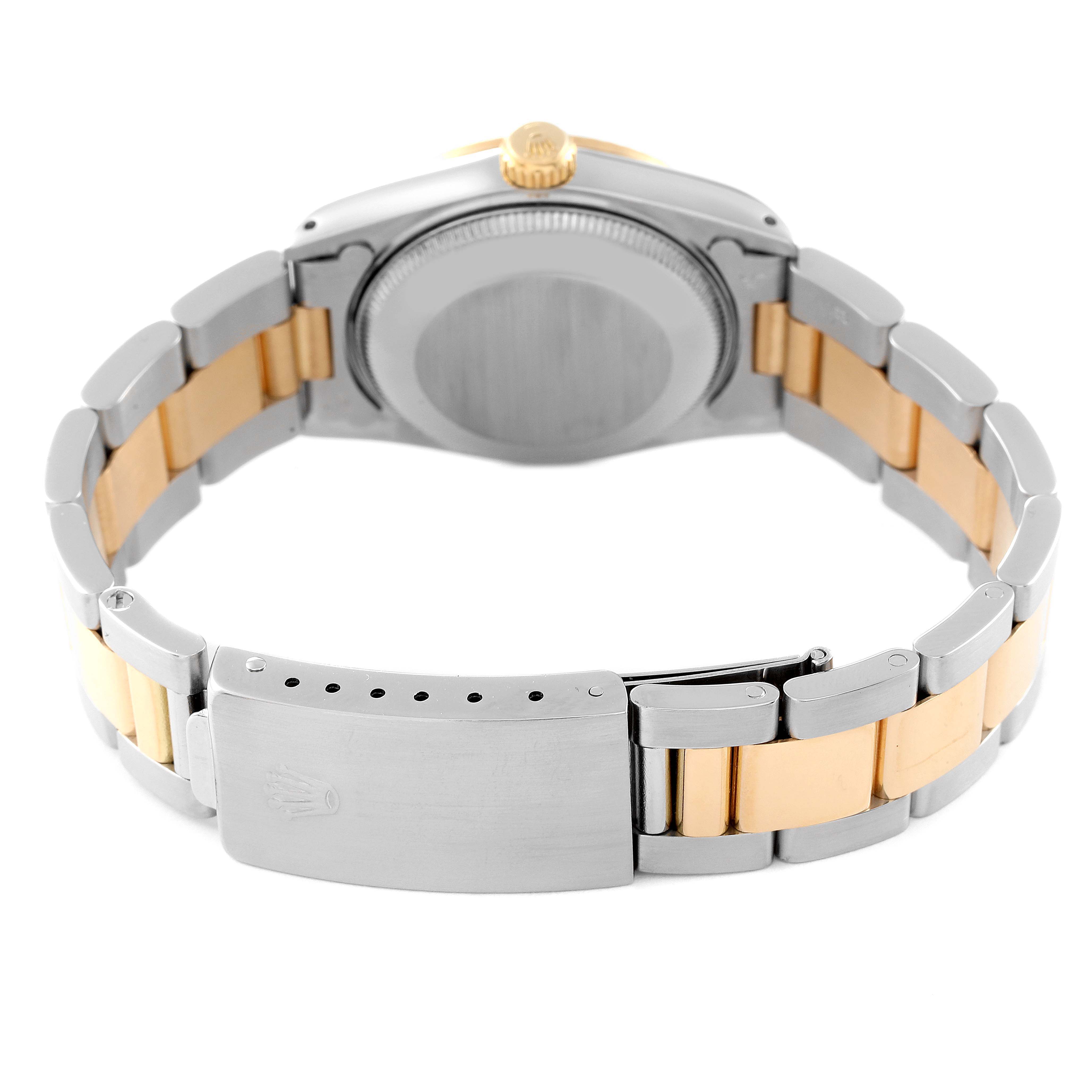 This image shows the back view and clasp of a Rolex Mid-Size 68273 Women's Steel and Gold (two tone) Black Dial 68273 Women's Steel and Gold (two tone) Black Dial model watch, highlighting the bi-metallic band and case back details.