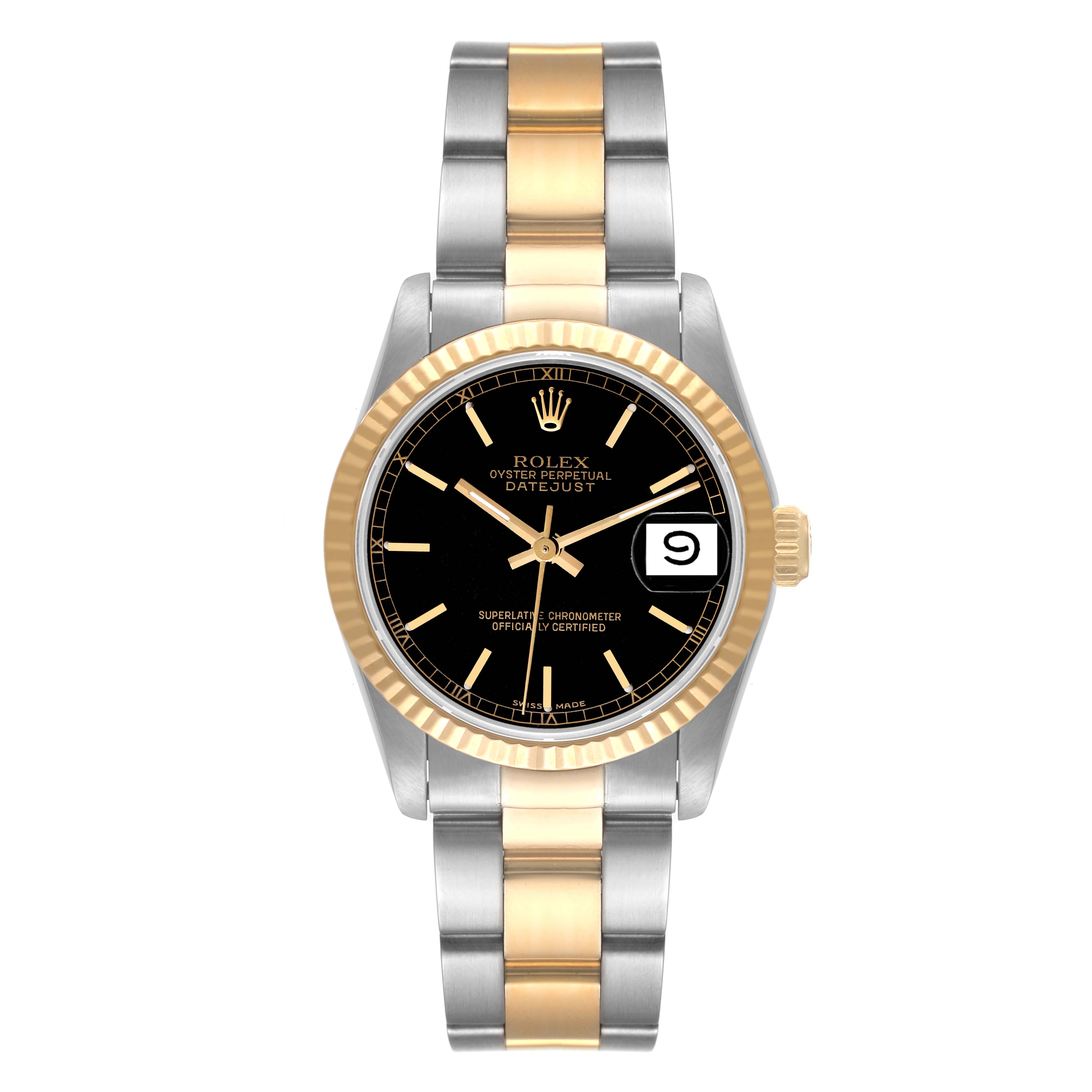This Rolex Mid-Size 68273 Women's Steel and Gold (two tone) Black Dial 68273 Women's Steel and Gold (two tone) Black Dial Datejust watch is shown from a front angle, displaying its black dial, gold fluted bezel, and two-tone bracelet.