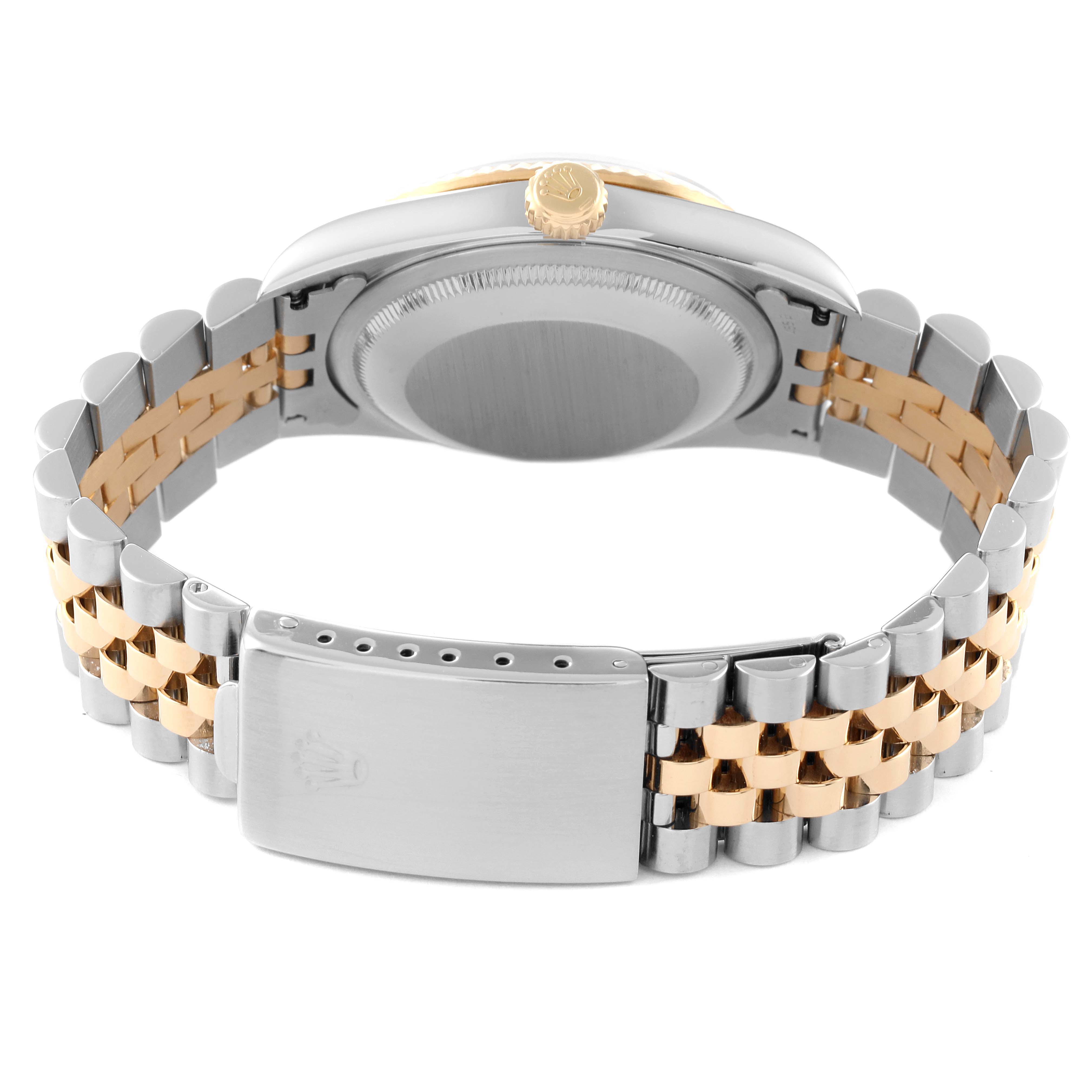 The image shows the back and clasp of a Rolex Datejust 16233 Men's Steel and Gold (two tone) Champagne Dial 16233 Men's Steel and Gold (two tone) Champagne Dial watch with a two-tone metal bracelet.