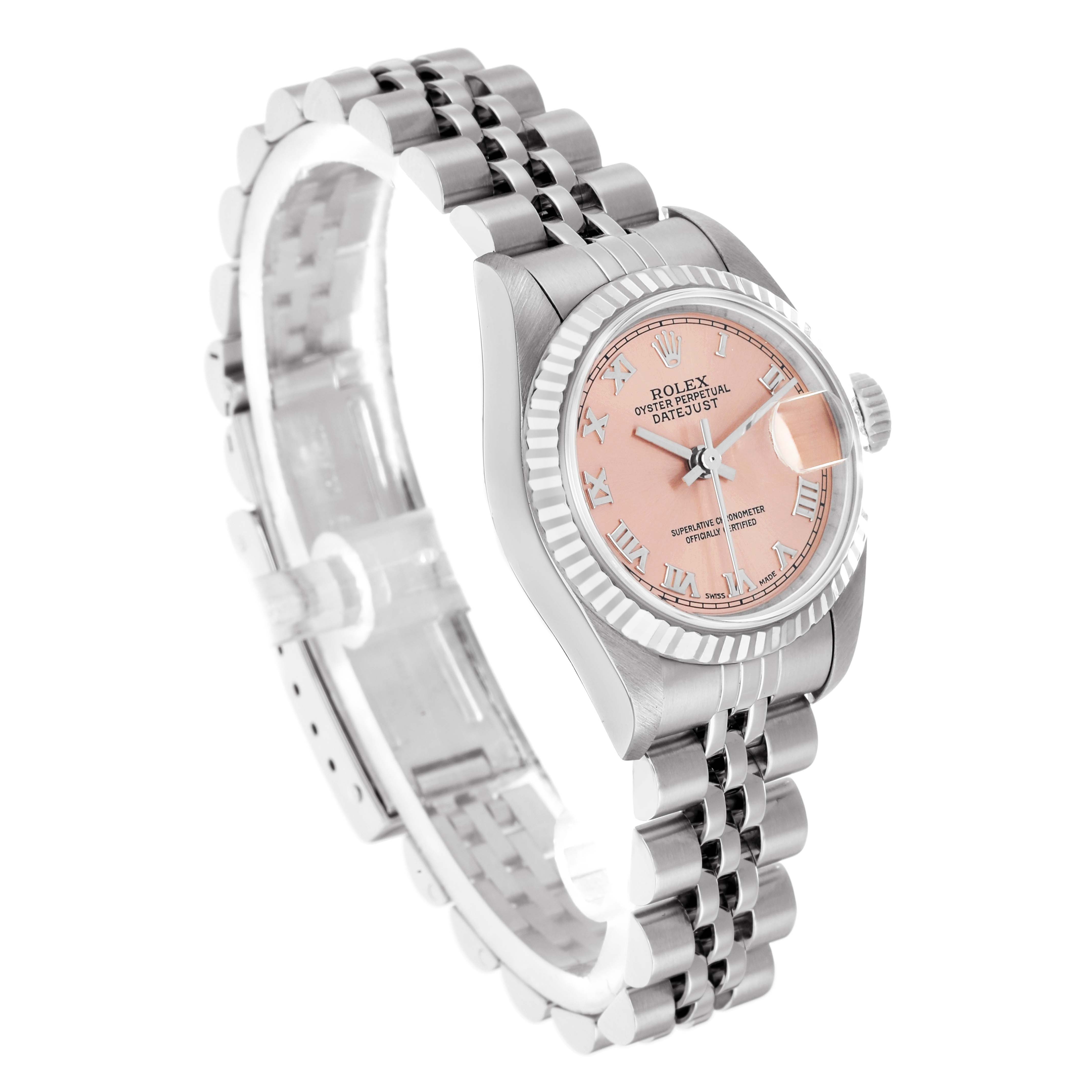 The Rolex Datejust 79174 Women
s Stainless Steel Pink Dial watch is shown at an angled view, displaying the face, bezel, and part of the jubilee bracelet.