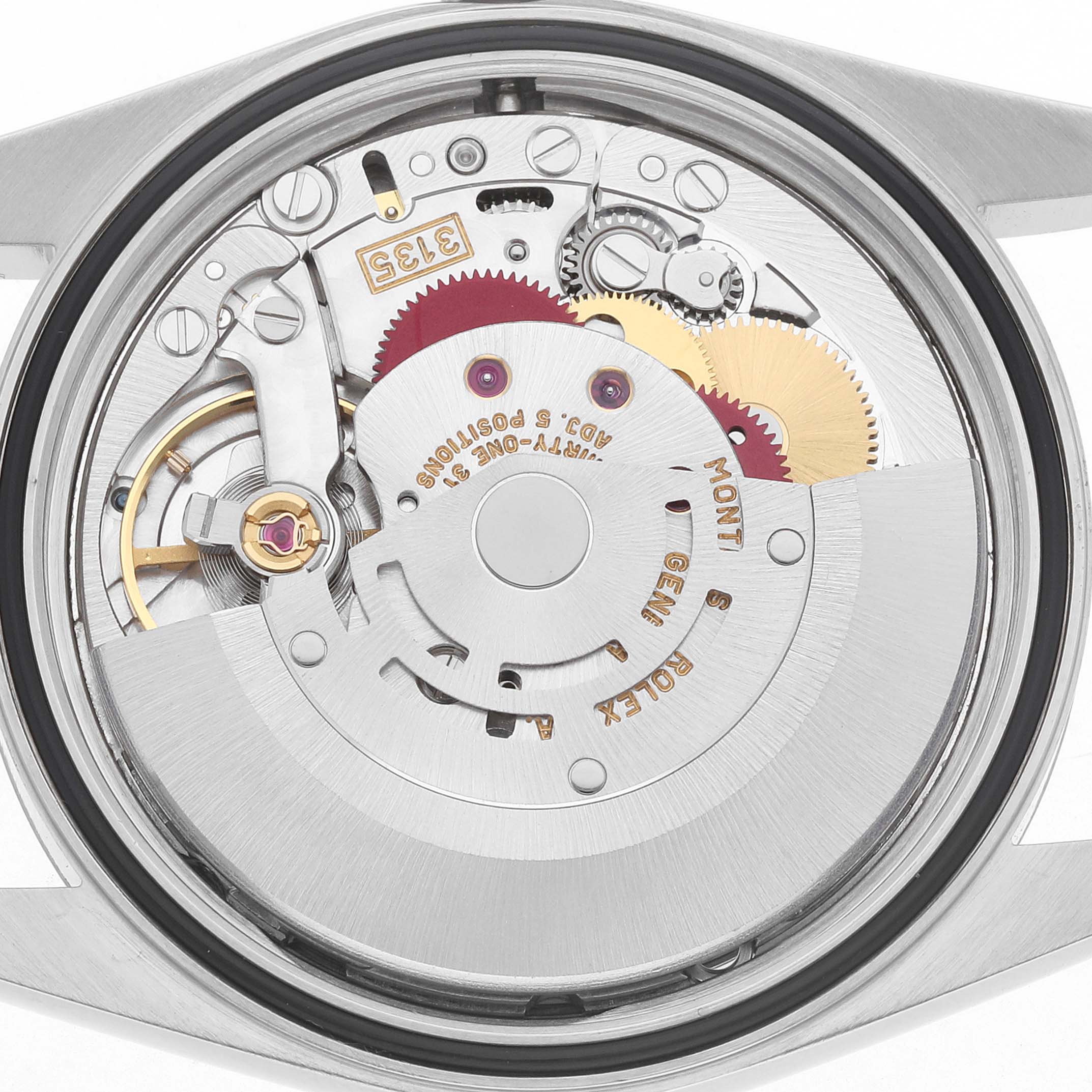 The image shows the back view of a Rolex Datejust 16234 Men
s Stainless Steel Silver Dial
s movement, highlighting gears and inner mechanics.