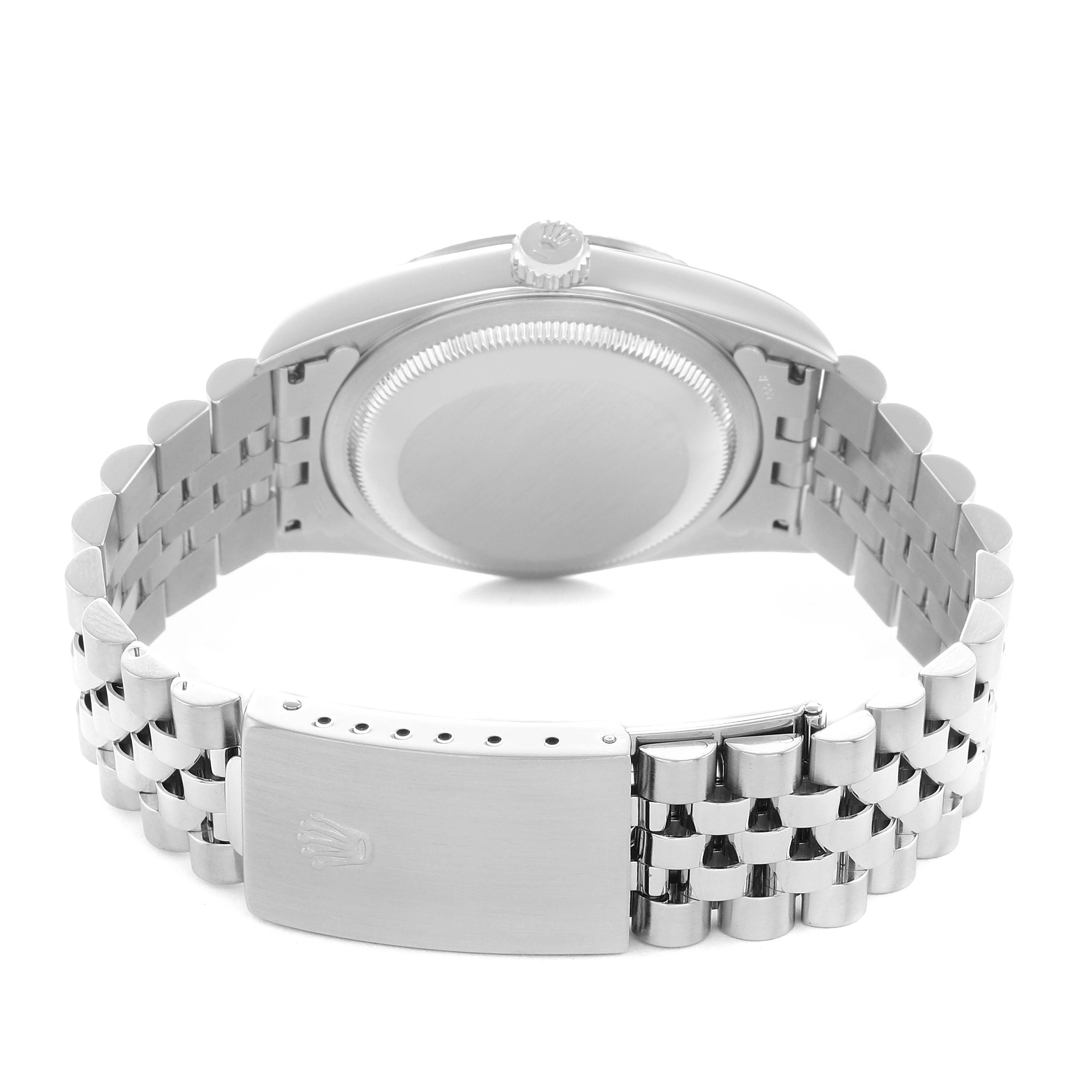 The image shows the back of a Rolex Datejust 16234 Men
s Stainless Steel Silver Dial, displaying its case back, crown, and Jubilee bracelet.