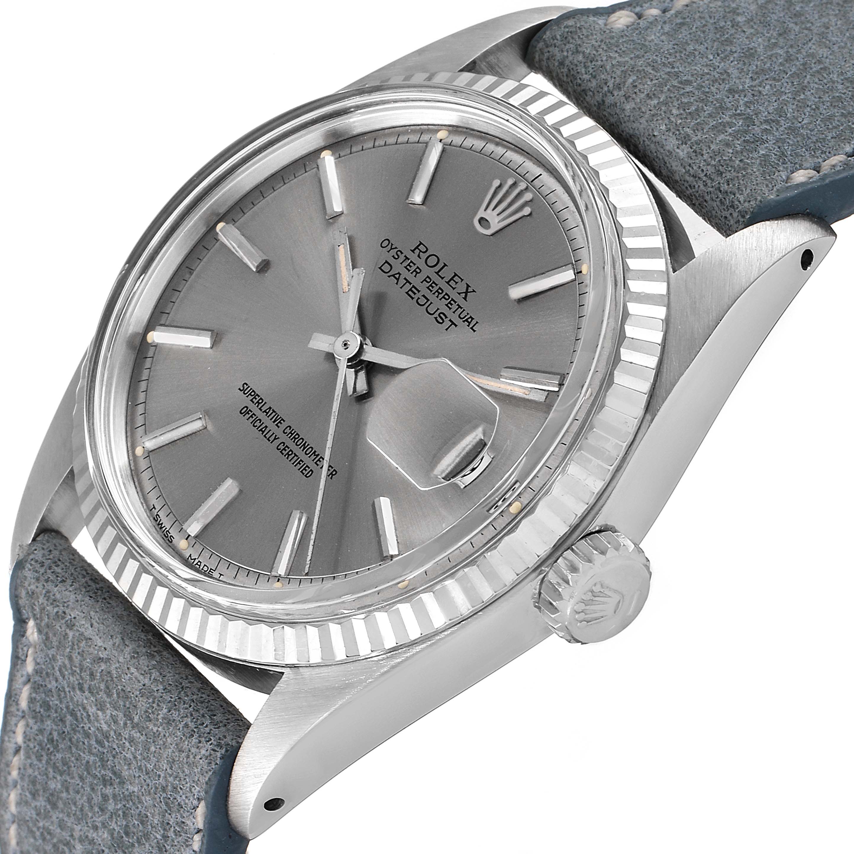 This image shows a close-up angled view of the Rolex Vintage Collection 1601 Men's Stainless Steel Grey Dial 1601 Men's Stainless Steel Grey Dial watch, highlighting its face, bezel, and crown, along with part of the strap.