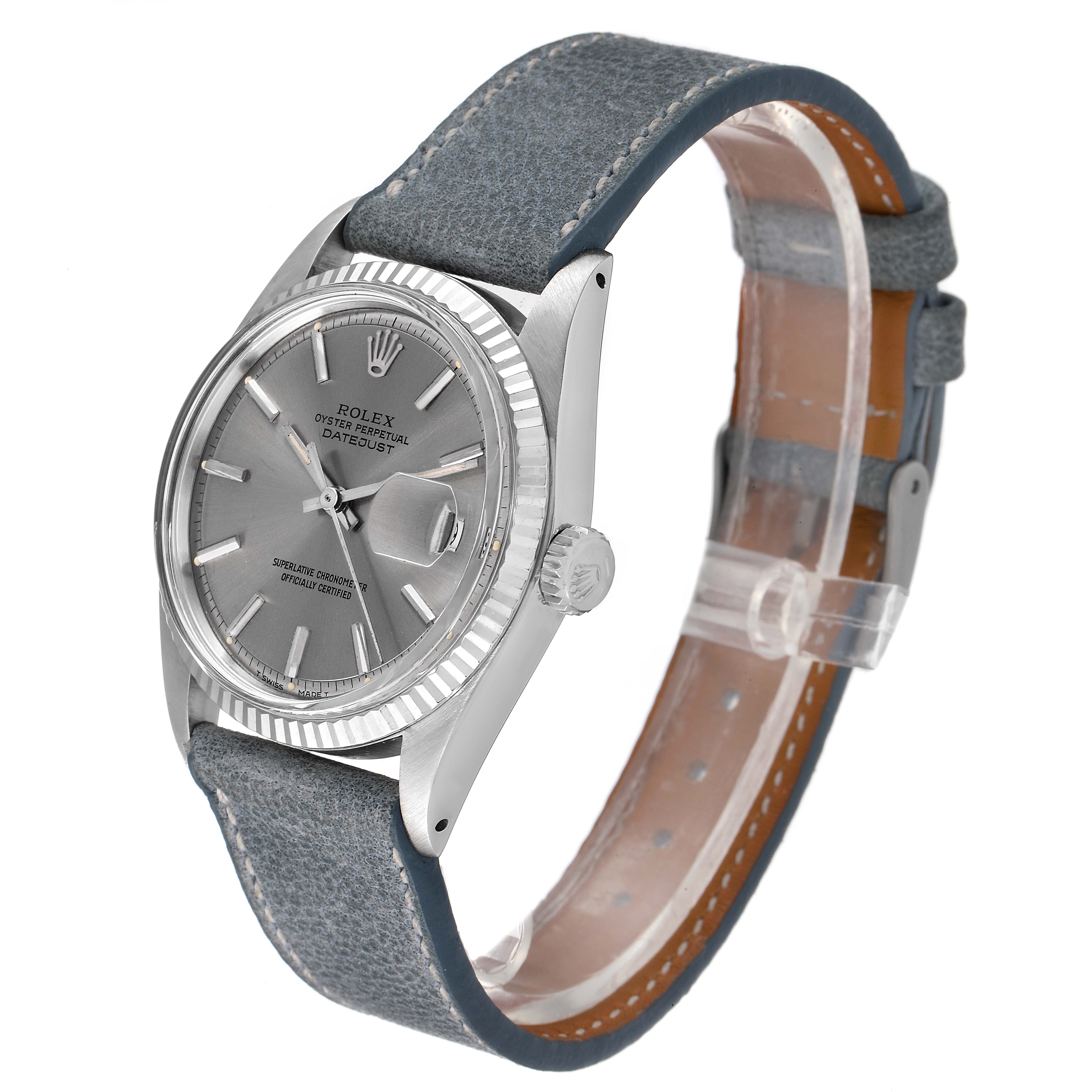 The image shows a Rolex Vintage Collection 1601 Men's Stainless Steel Grey Dial 1601 Men's Stainless Steel Grey Dial model watch at an angled side view, highlighting the dial, bezel, crown, and leather strap.