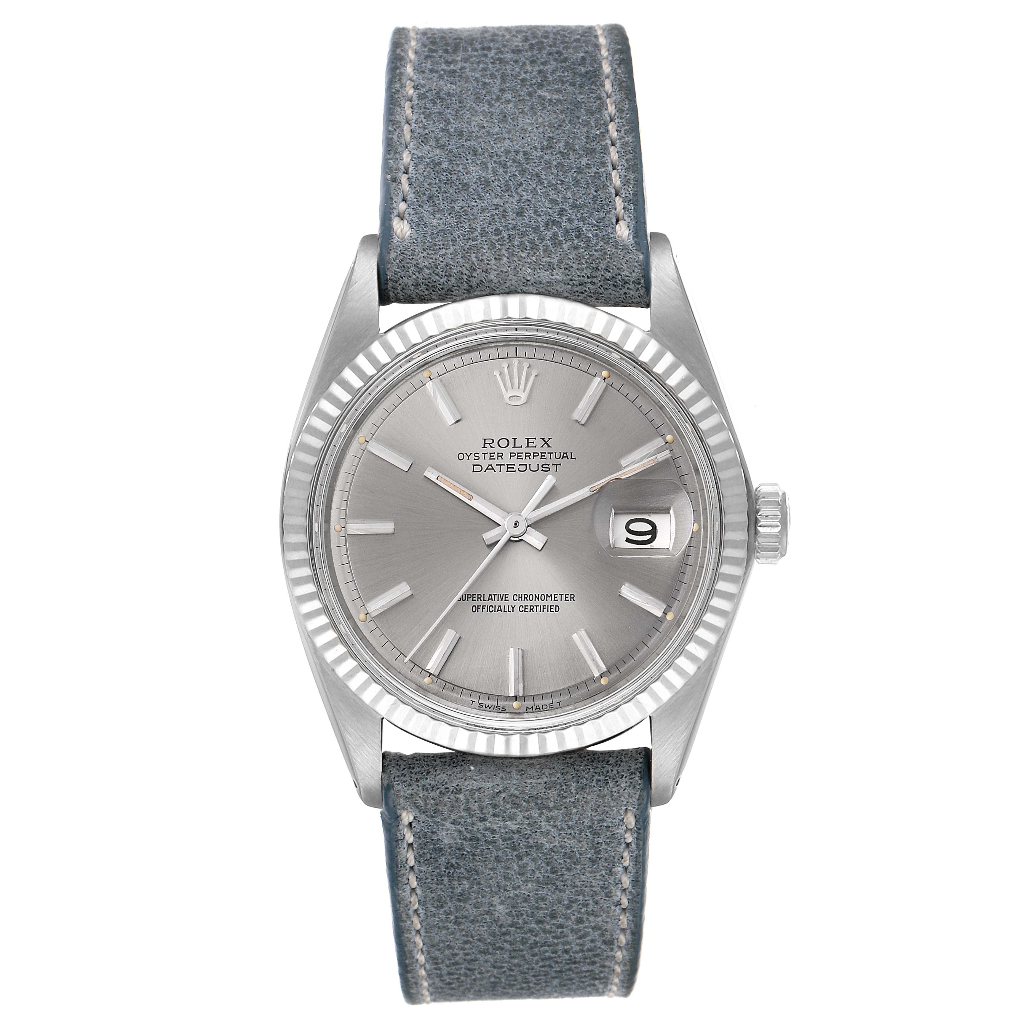 This is a front view of a Rolex Vintage Collection 1601 Men's Stainless Steel Grey Dial 1601 Men's Stainless Steel Grey Dial model, showcasing the dial, hands, date window, bezel, and leather strap.