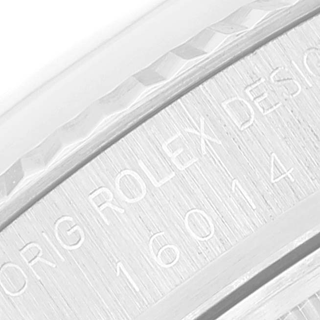 This close-up image shows the engraving on the case back of a Rolex Vintage Collection 16014 Men
s Stainless Steel Silver Dial 16014 Men
s Stainless Steel Silver Dial model.