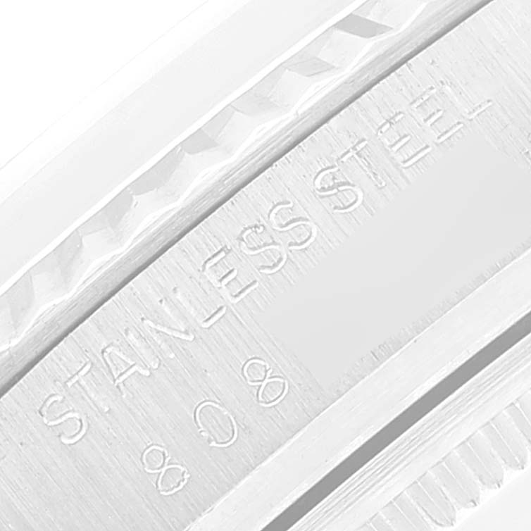 The image shows a close-up angle of the stainless steel case back of the Rolex Vintage Collection 16014 Men
s Stainless Steel Silver Dial 16014 Men
s Stainless Steel Silver Dial watch with engravings.