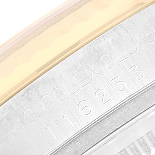 This close-up angle shows the serial number engraving on the Rolex Datejust 116233 Men's Steel and Gold (two tone) Blue Dial 116233 Men's Steel and Gold (two tone) Blue Dial watch's casing.
