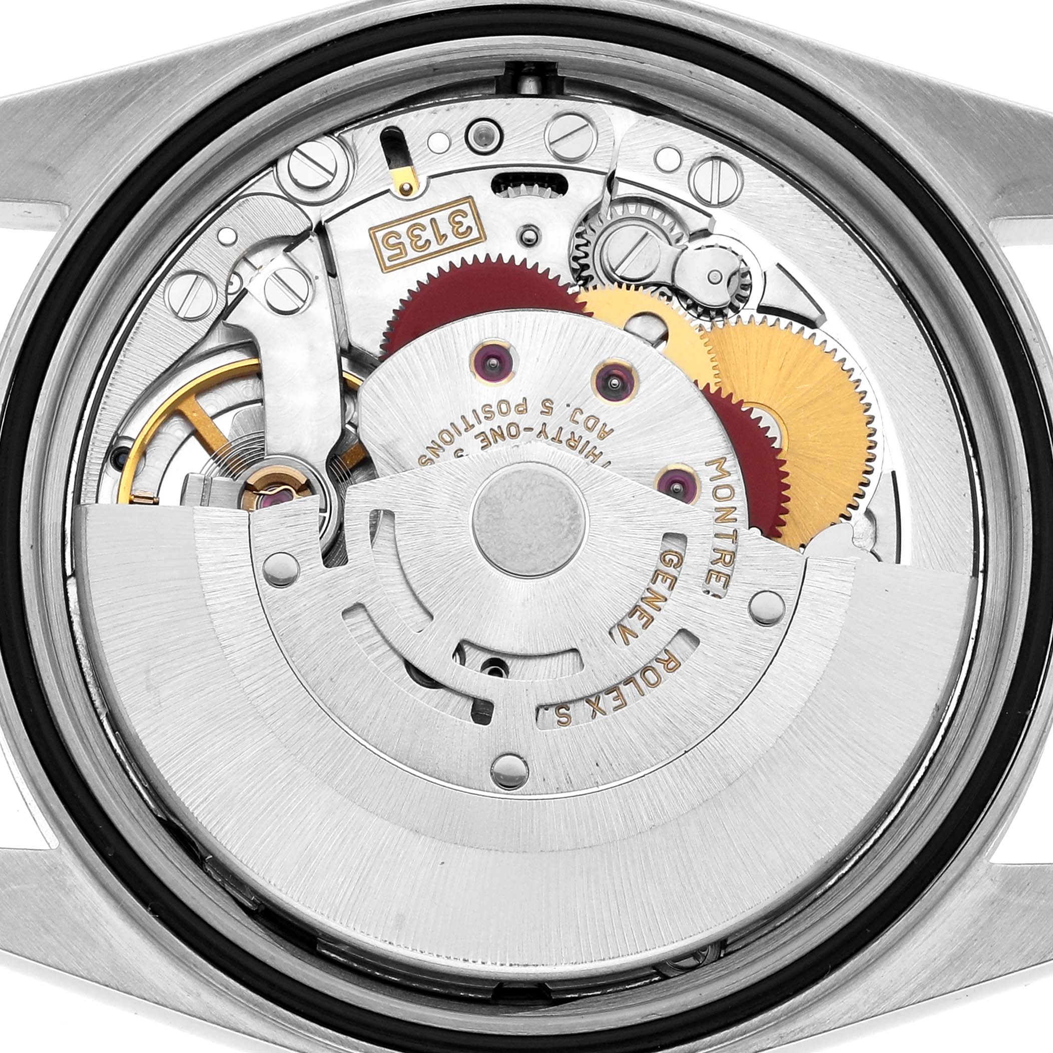 The image shows the movement of a Rolex Datejust 16203 Men
s Steel and Gold (two tone) Silver Dial, viewed from the back, revealing its intricate mechanical components.