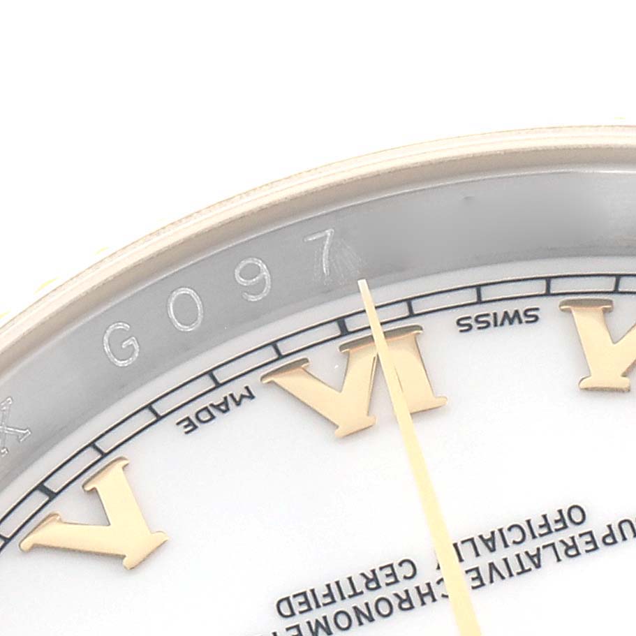 The image shows a close-up of the Rolex Datejust 116233 Men
s Steel and Gold (two tone) White Dial watch dial, focusing on the Roman numerals and inner bezel.