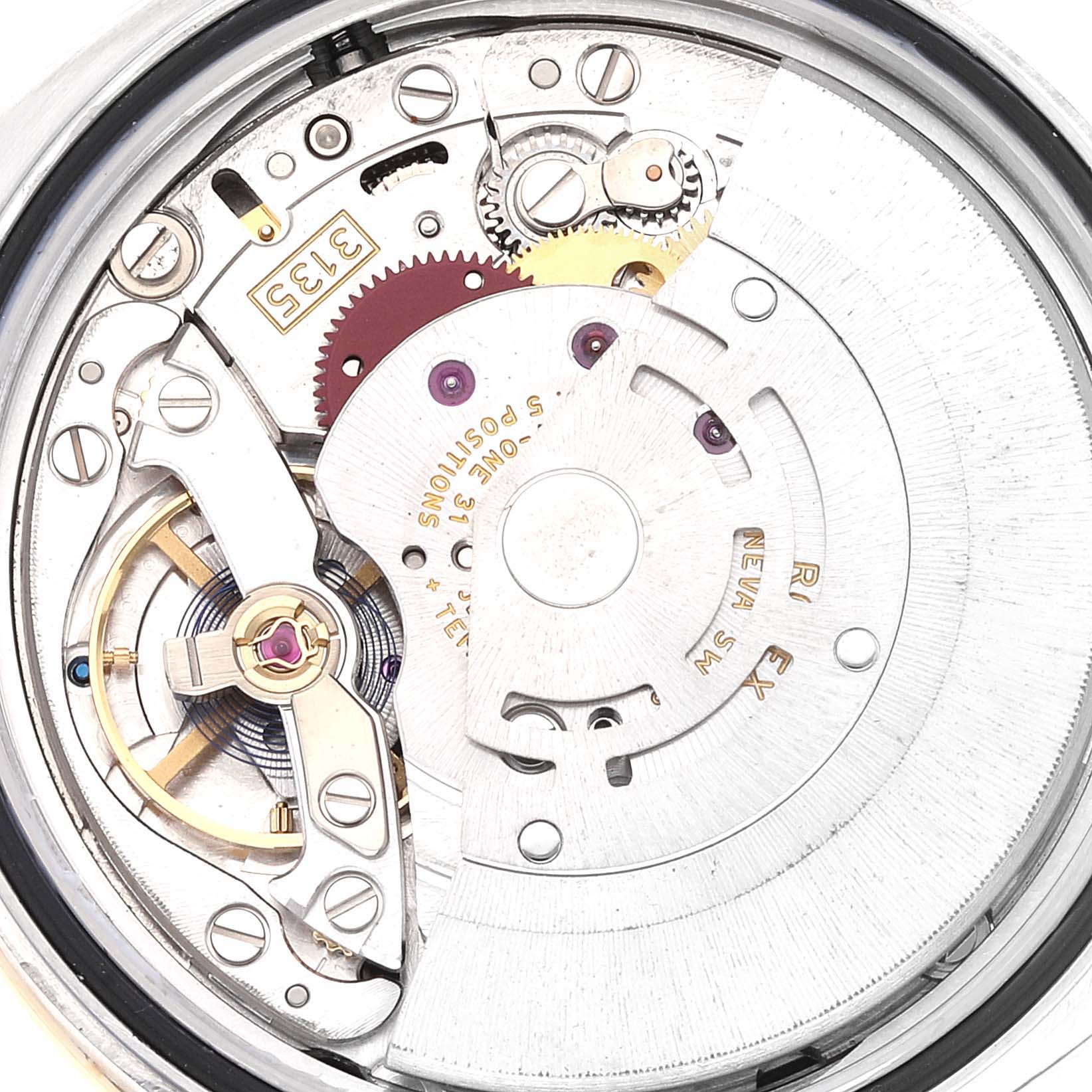 This image shows the intricate inner workings and movement mechanism of a Rolex Datejust 116243 Men's Steel and Gold (two tone) Black Dial 116243 Men's Steel and Gold (two tone) Black Dial watch from a close-up angle.