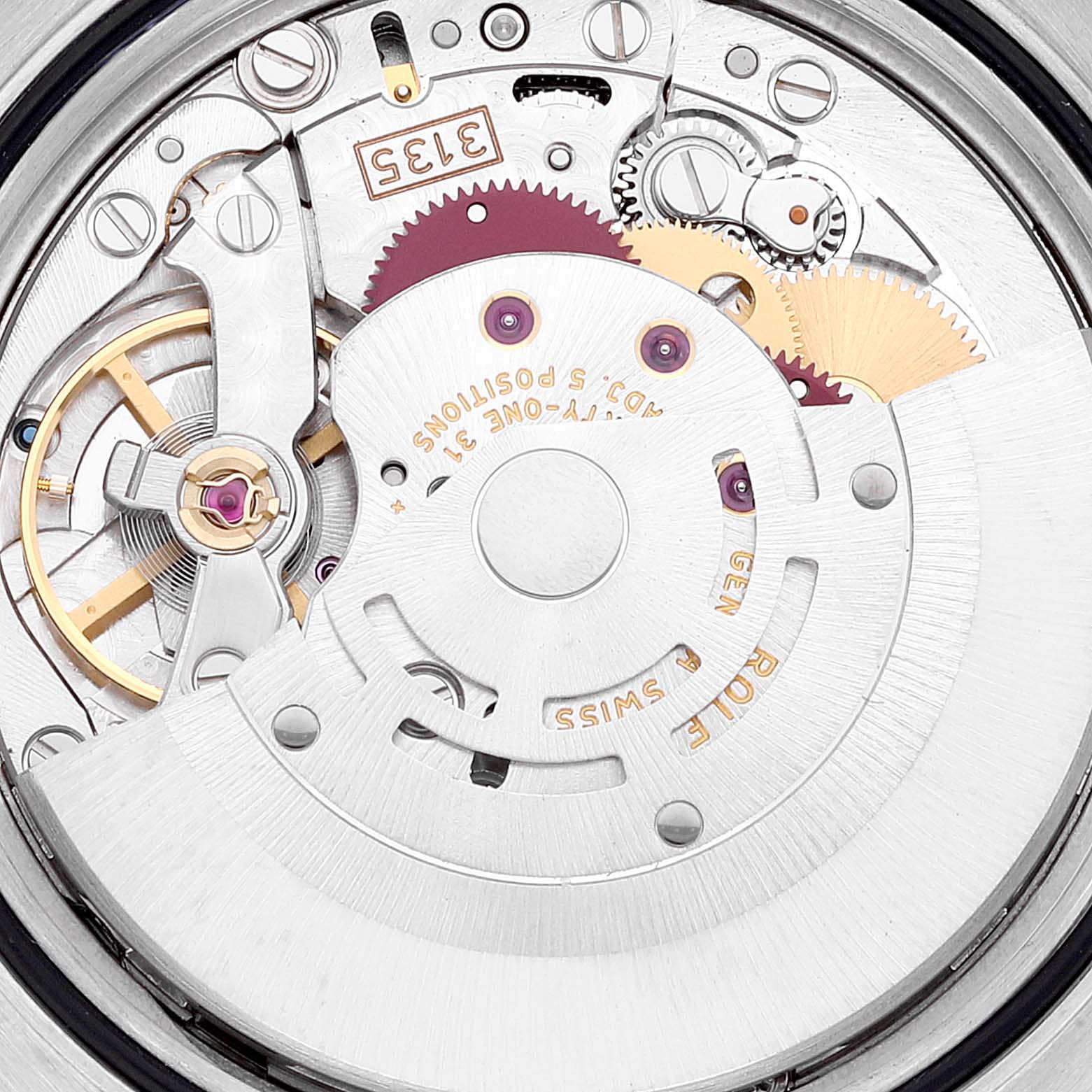 This image shows a close-up view of the Rolex Datejust 116233 Men's Steel and Gold (two tone) White Dial 116233 Men's Steel and Gold (two tone) White Dial watch's internal movement, highlighting its intricate gears and components.