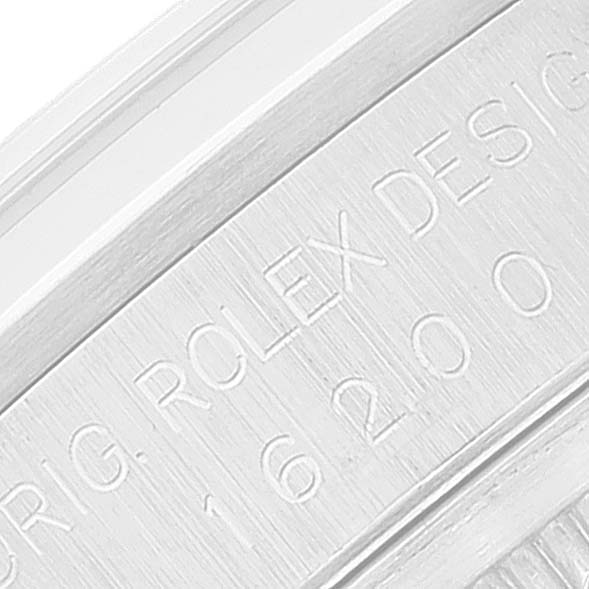 The image shows a close-up of the engraved inner rim of the case of a Rolex Datejust 16200 Men's Stainless Steel White Dial 16200 Men's Stainless Steel White Dial watch.