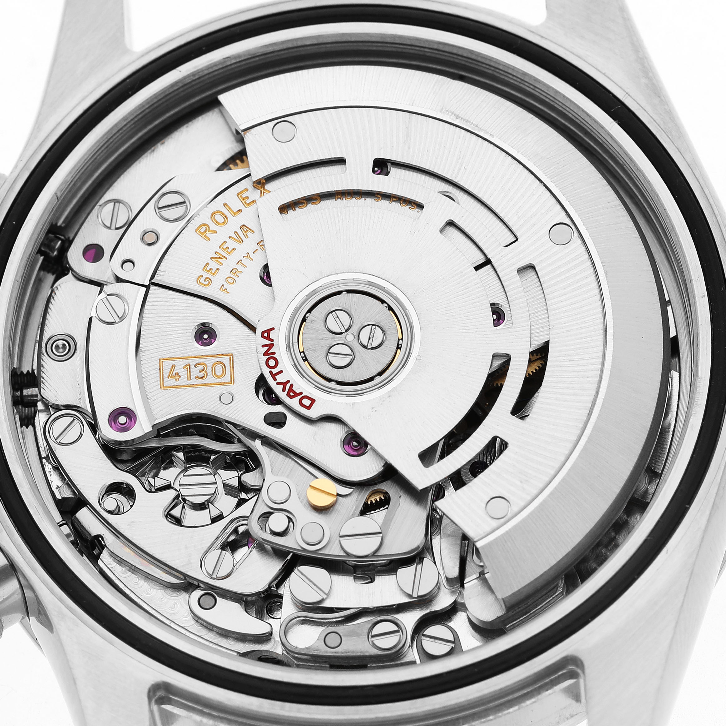 The image shows the movement mechanism of a Rolex Daytona 116520 Men's Stainless Steel Black Dial model from a top-down angle.
