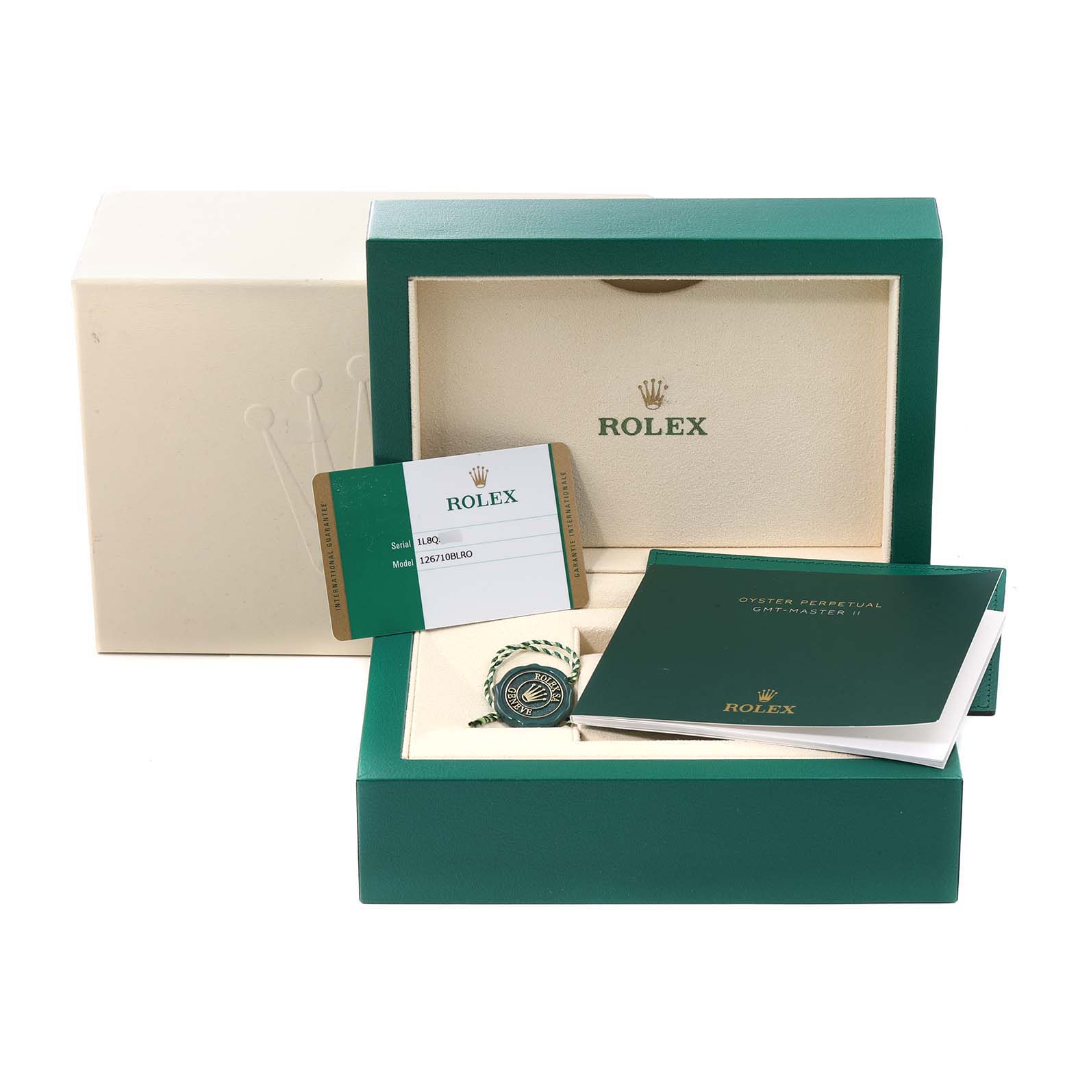 The image shows the packaging, manual, warranty card, and tags for a Rolex GMT-Master 126710 Men
s Stainless Steel Black Dial 126710 Men
s Stainless Steel Black Dial watch.