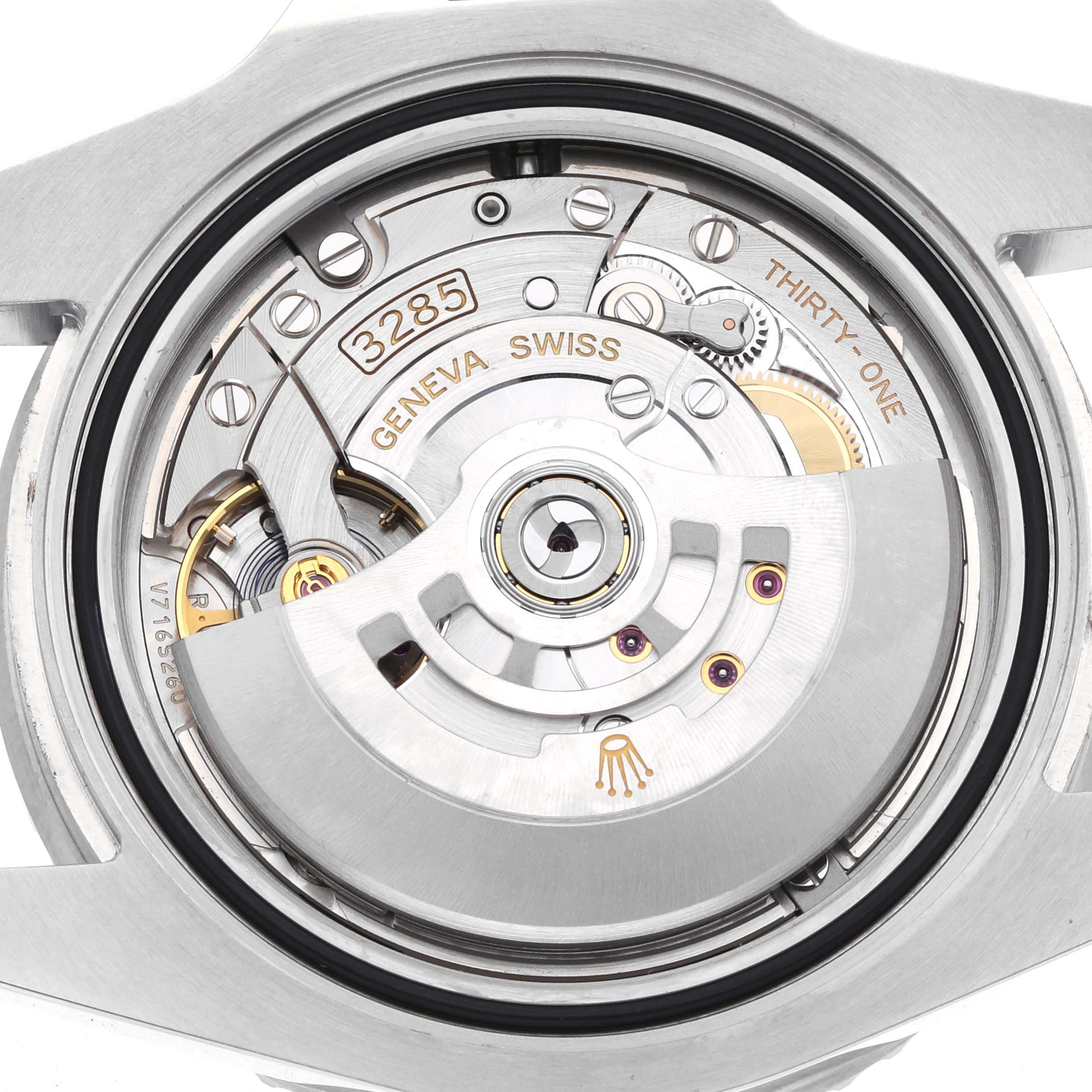 The image shows the Rolex GMT-Master 126710 Men
s Stainless Steel Black Dial
s movement from the back, highlighting the rotor and intricate inner mechanisms.