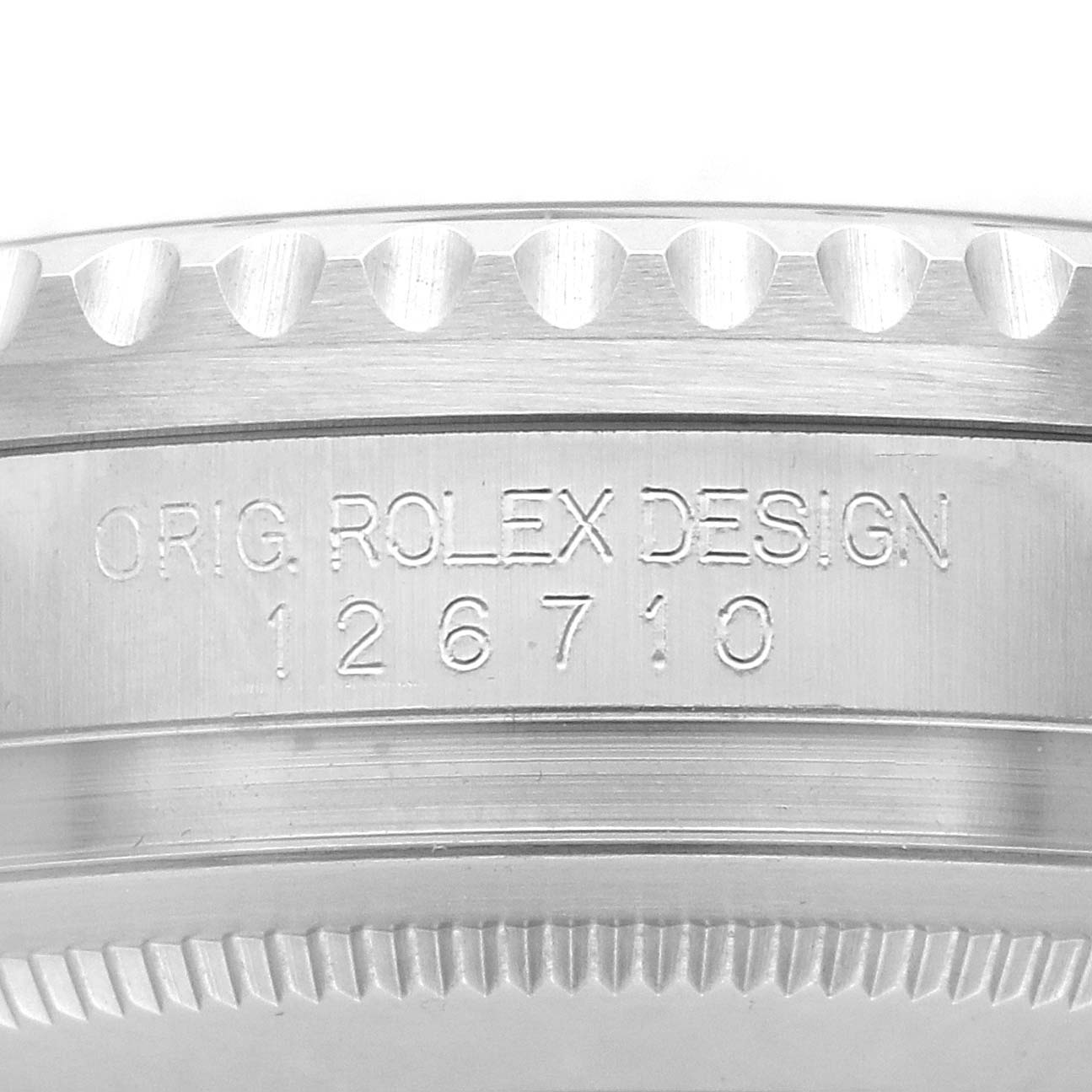 This image shows the side view of the bezel and case of a Rolex GMT-Master 126710 Men
s Stainless Steel Black Dial, displaying the model number 126710.