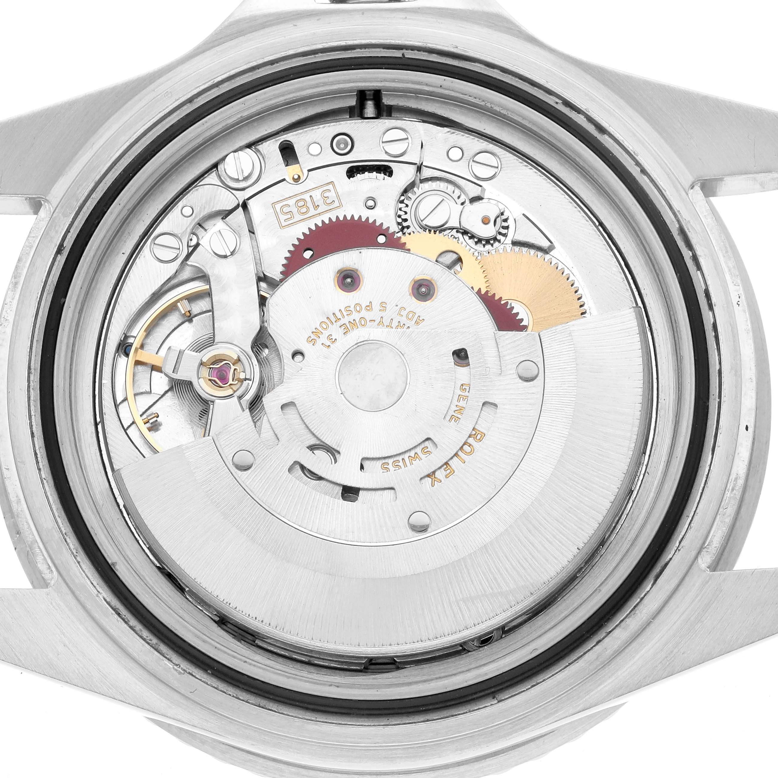 The image shows the movement of a Rolex GMT-Master 16710 Men
s Stainless Steel Black Dial watch from a back angle, displaying gears and the intricate mechanism.