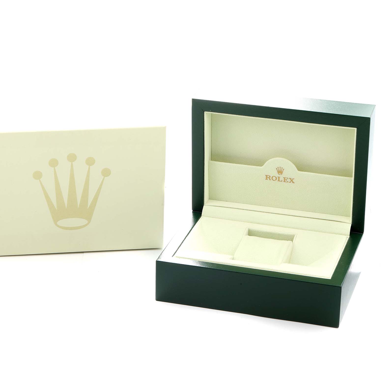 The image shows an open Rolex GMT-Master 116718 Men's Yellow Gold Green Dial watch box and an accompanying card or booklet, angled slightly from the front.