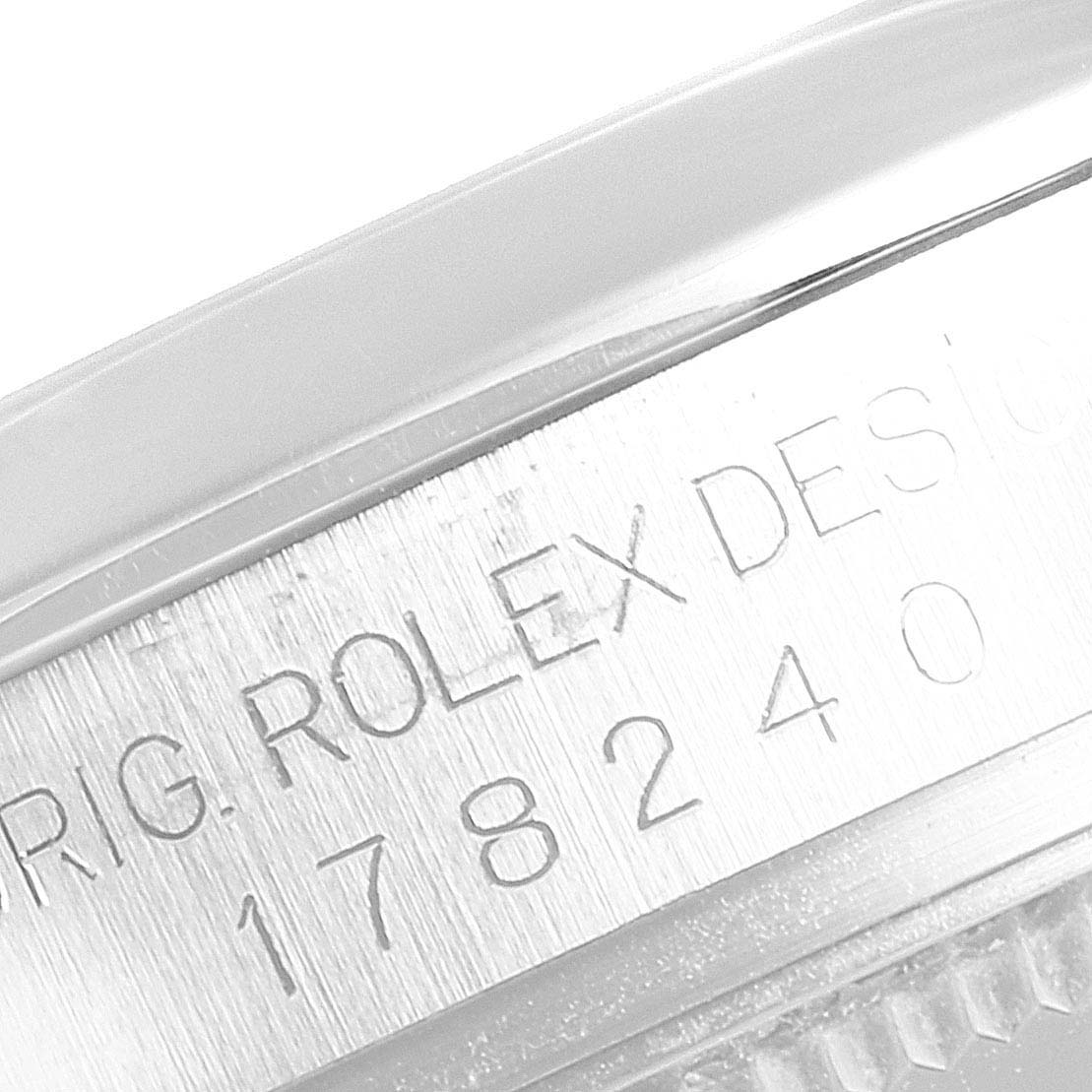 The image shows a close-up of the model number engraving on the side of a Mid-Size Rolex watch.