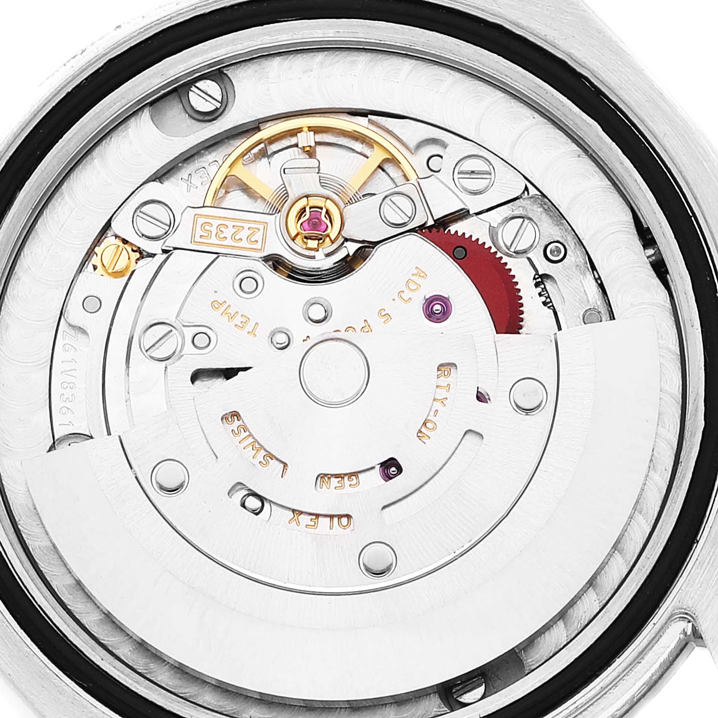 The image shows the internal mechanics and movement of a Mid-Size Rolex watch from the back angle.
