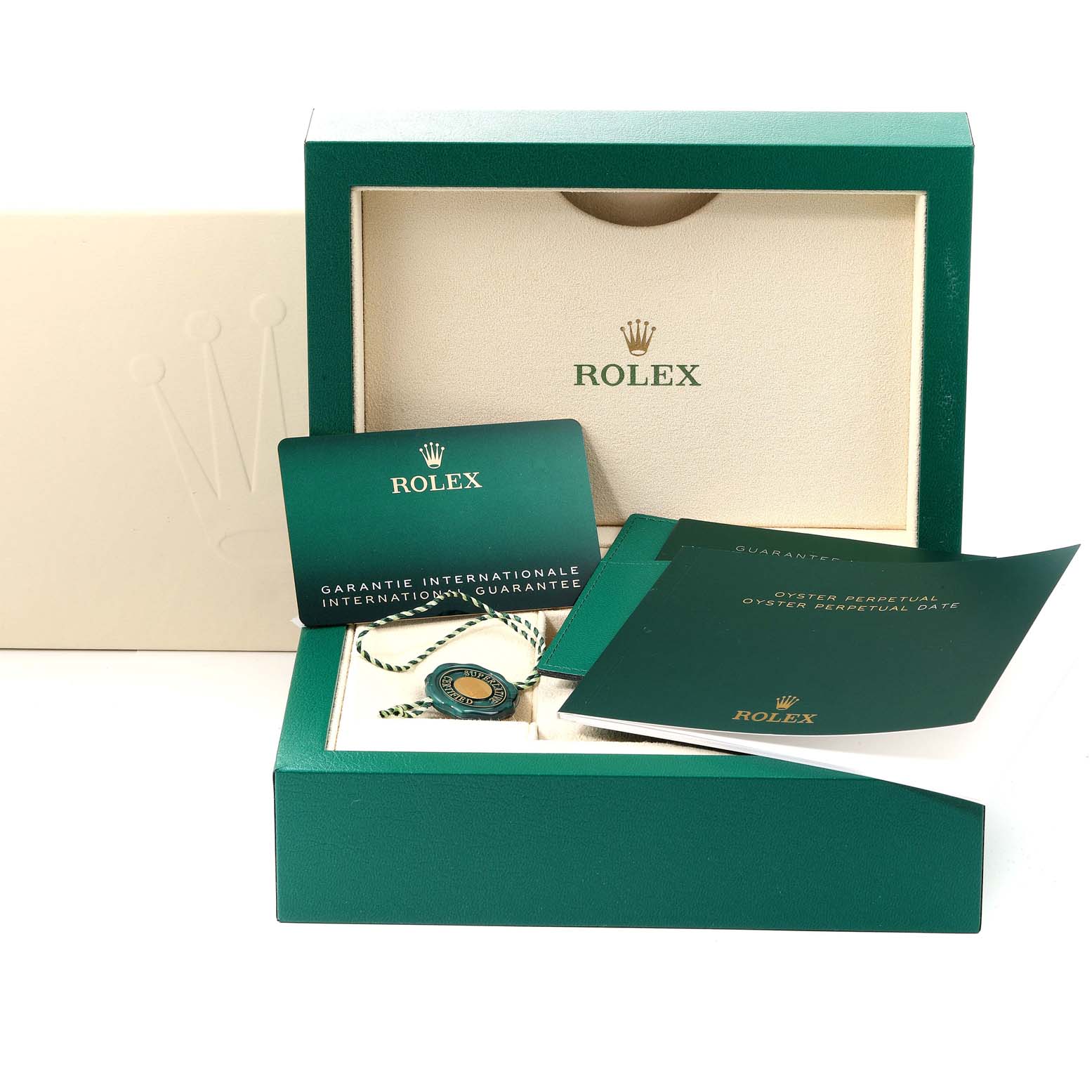 The image shows the Rolex Oyster Perpetual 124200 Men
s Stainless Steel Blue Dial 124200 Men
s Stainless Steel Blue Dial box, warranty cards, and tags arranged in an open display.