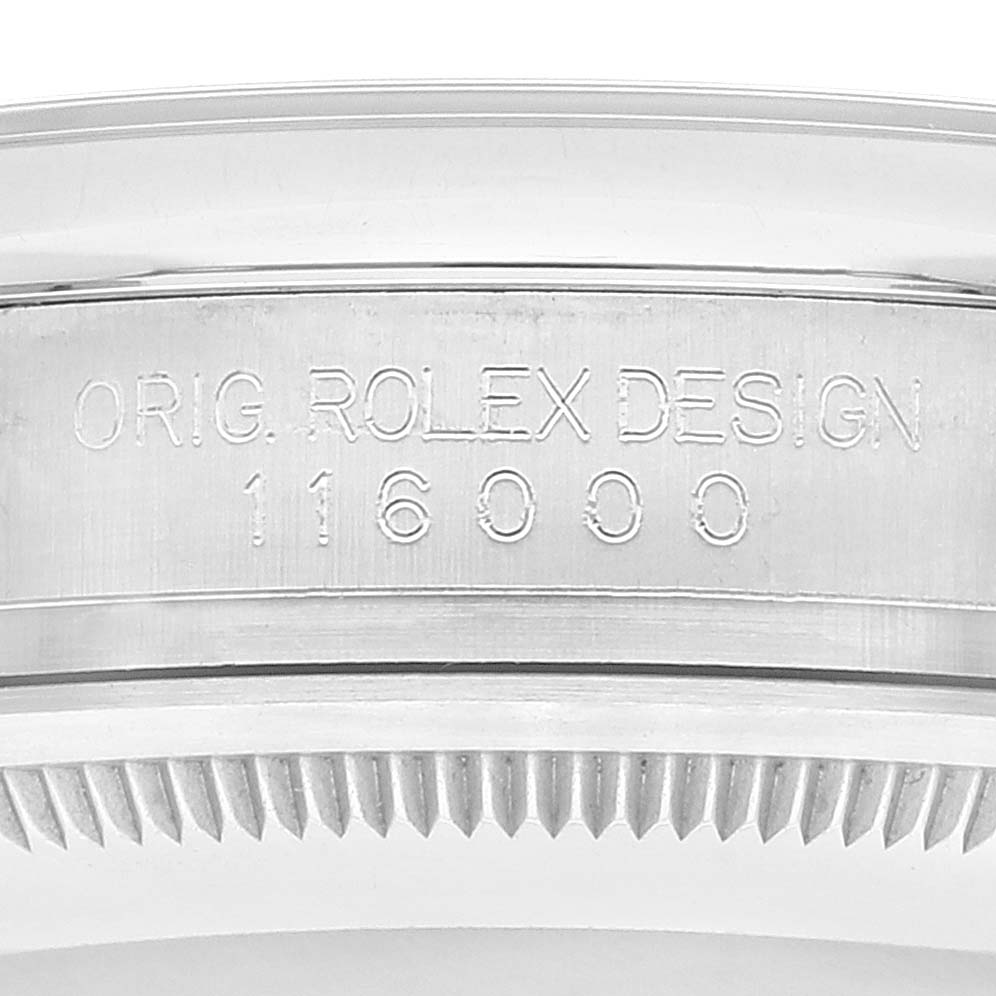This image shows the side of the Rolex Oyster Perpetual 116000 Men
s Stainless Steel Black Dial 116000 Men
s Stainless Steel Black Dial watch case, featuring the model number 116000.