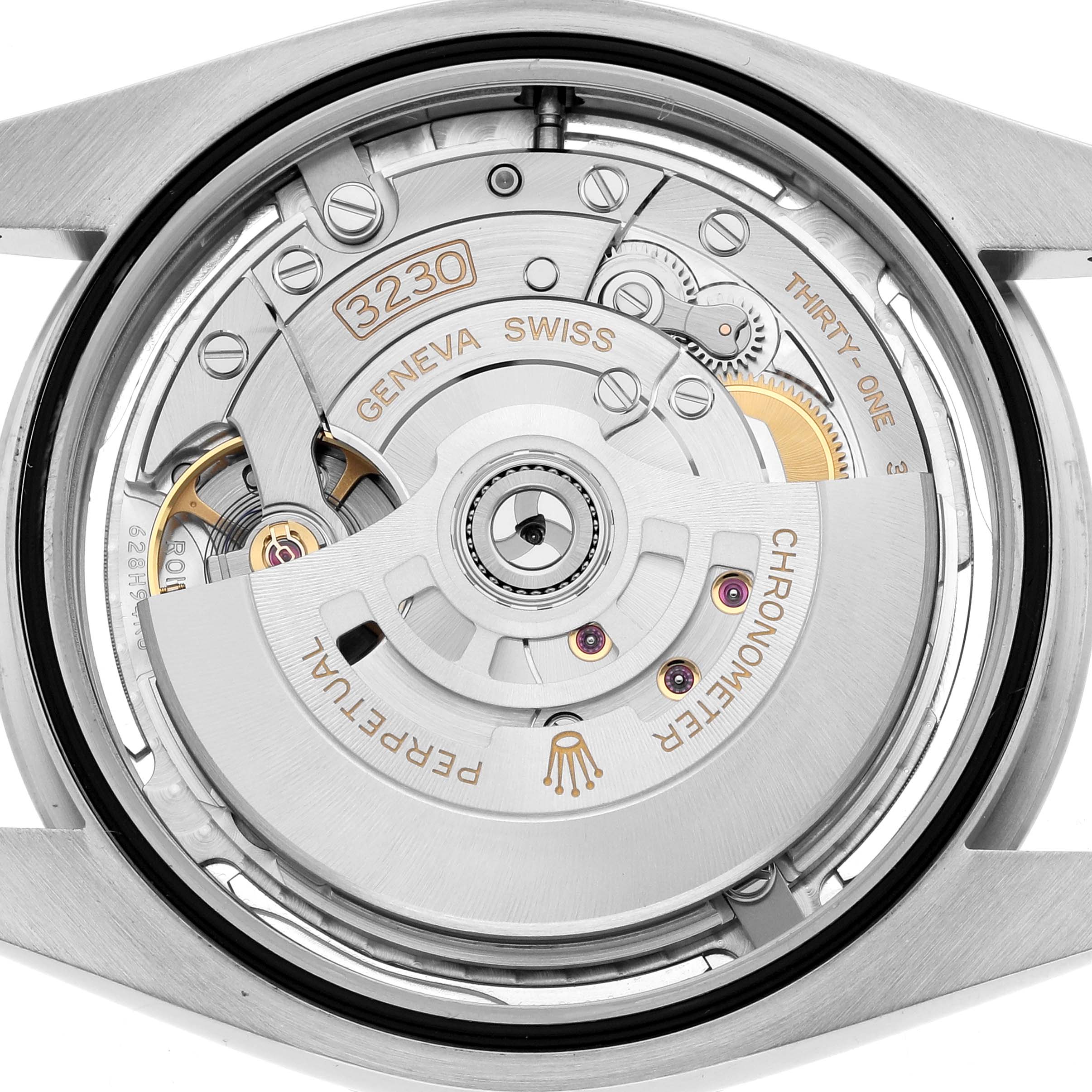 The image shows the movement from the back of a Rolex Oyster Perpetual 124300 Men
s Stainless Steel Silver Dial, highlighting its intricate mechanical components.