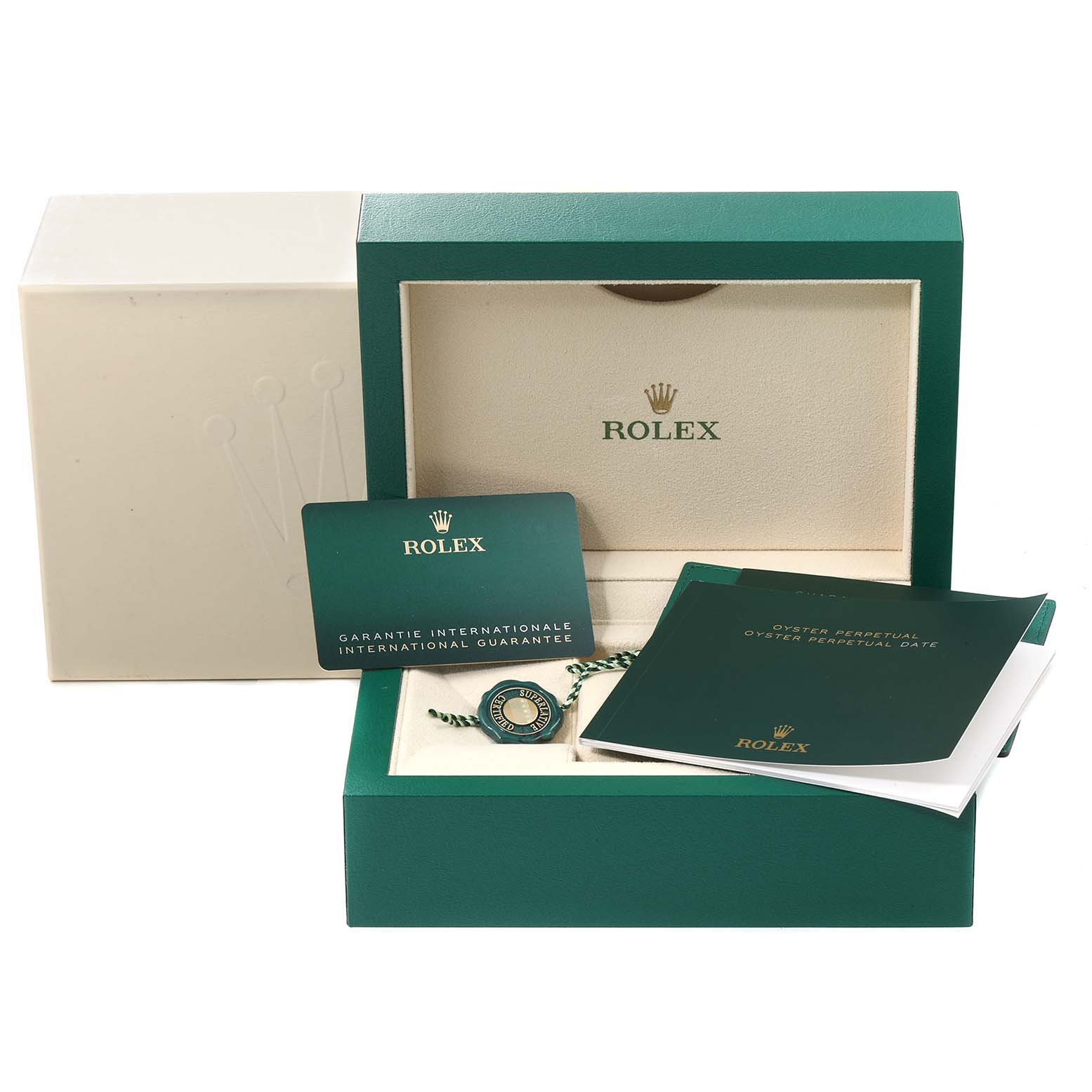 The image shows the packaging, warranty card, and manuals for a Rolex Oyster Perpetual 126000 Men's Stainless Steel Silver Dial 126000 Men's Stainless Steel Silver Dial watch.