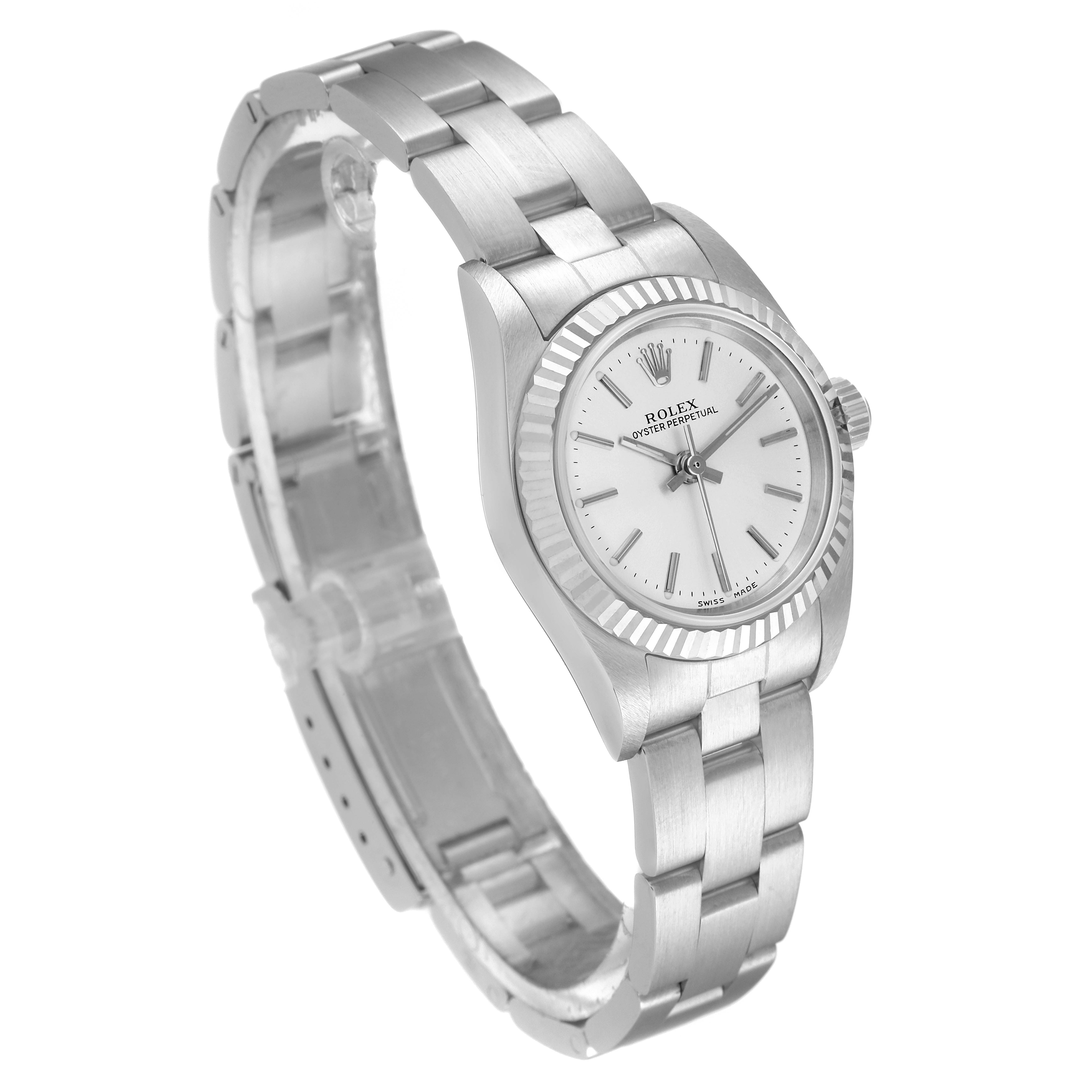This Rolex Oyster Perpetual 76094 Women's Stainless Steel Silver Dial 76094 Women's Stainless Steel Silver Dial watch is shown at a three-quarter angle, displaying the dial, bezel, case, and bracelet.