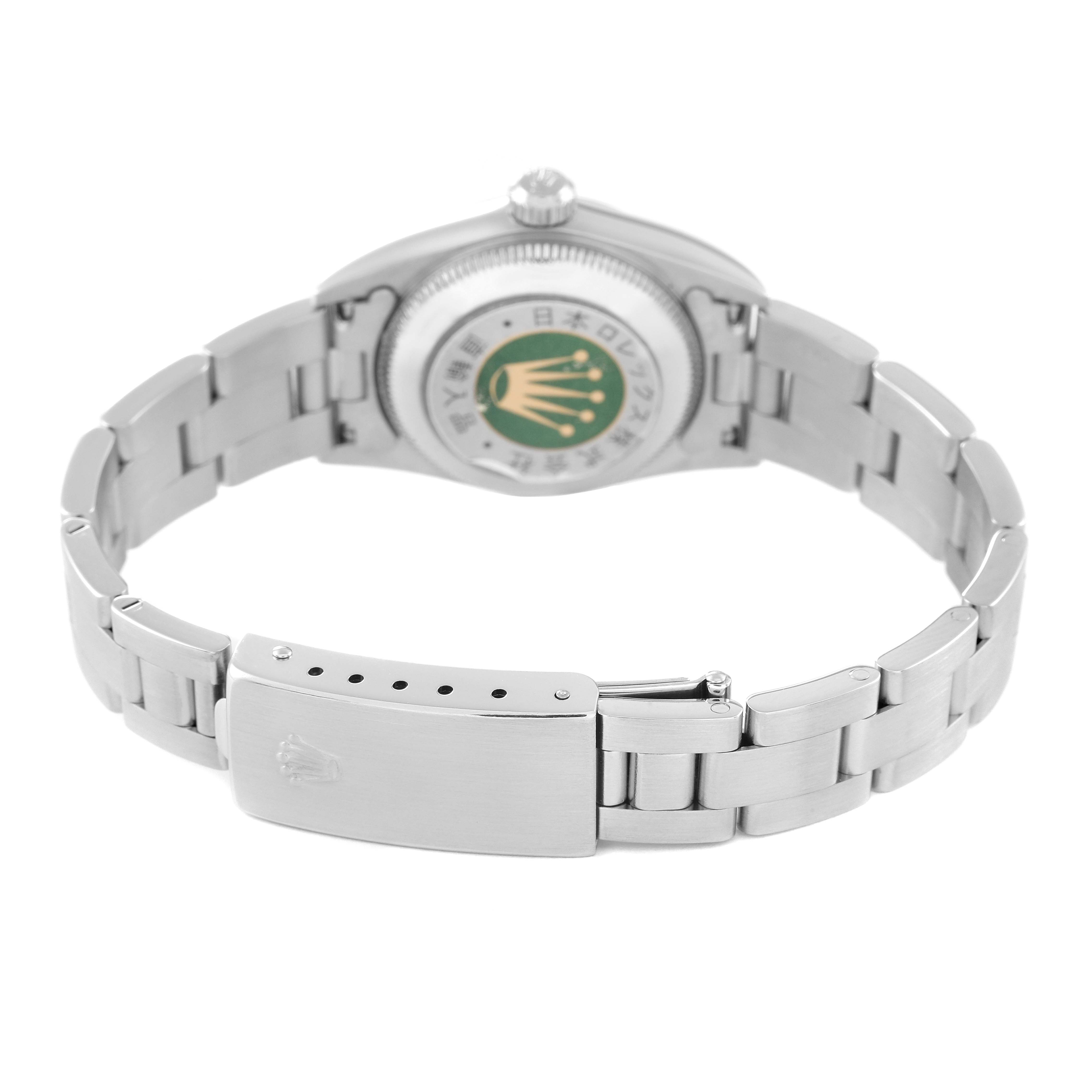 This is a rear view of a Rolex Oyster Perpetual 76094 Women's Stainless Steel Silver Dial 76094 Women's Stainless Steel Silver Dial watch, showing the bracelet and case back with Rolex branding.