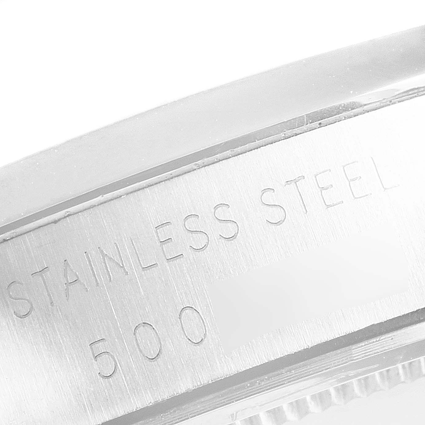The image shows a close-up of the side engraving that reads "STAINLESS STEEL 500" on the Rolex Vintage Collection 6694 Men's Stainless Steel Silver Dial 6694 Men's Stainless Steel Silver Dial watch.