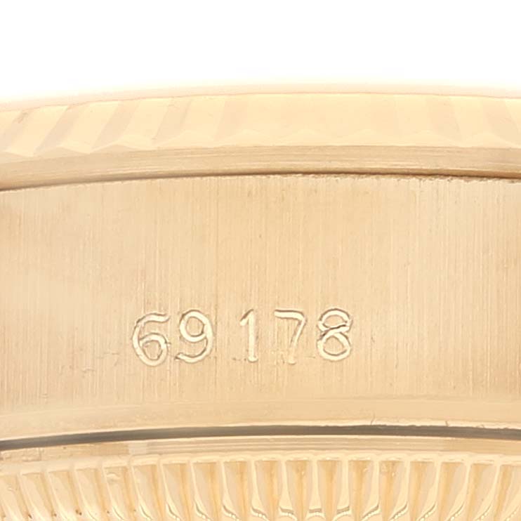 This image shows a close-up of the engraved model number "69178" on a Rolex President 69178 Women
s Yellow Gold Champagne Dial 69178 Women
s Yellow Gold Champagne Dial watch.