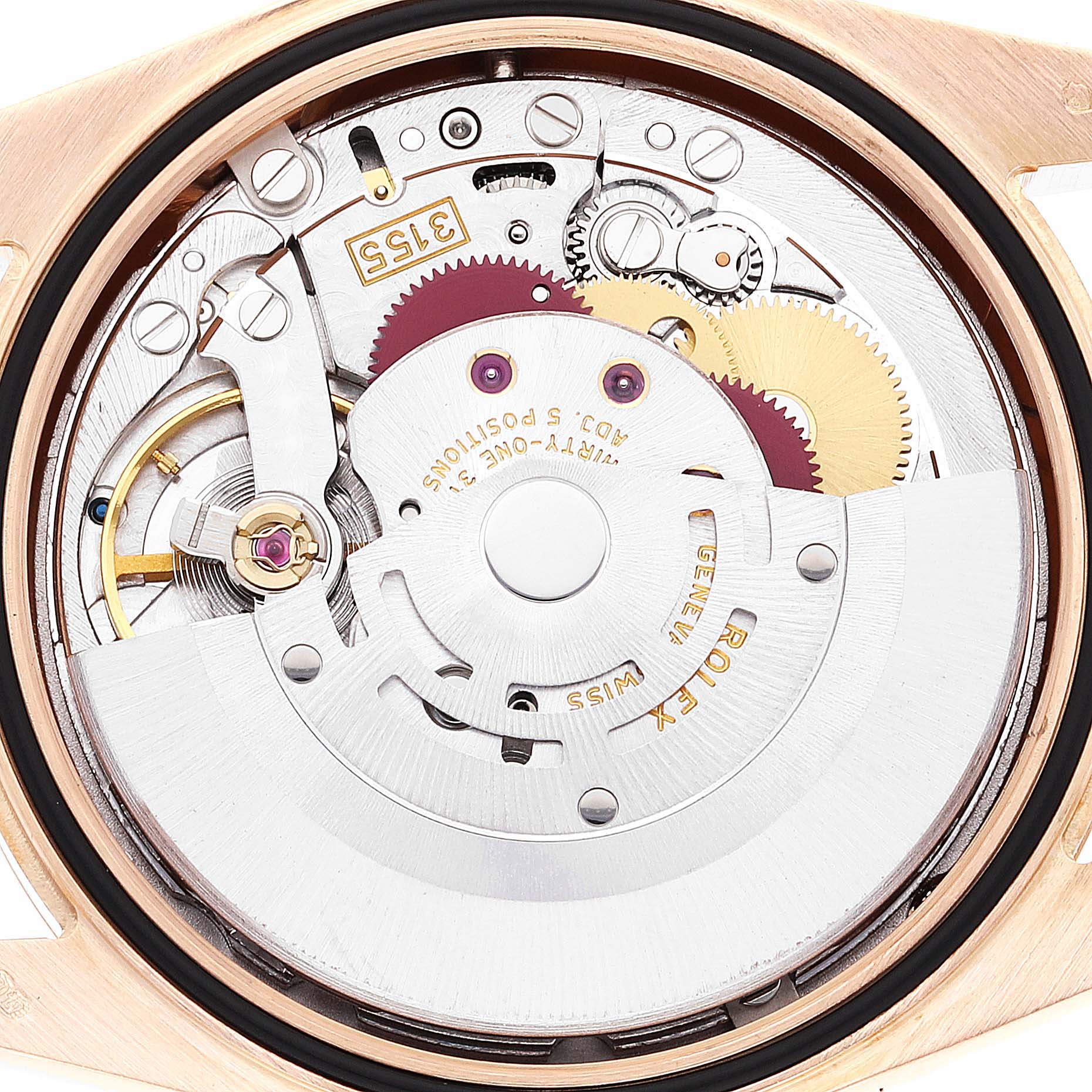 This is an internal view of a Rolex President 118235 Men's Rose Gold Black Dial 118235 Men's Rose Gold Black Dial watch showing its intricate mechanical movement components.