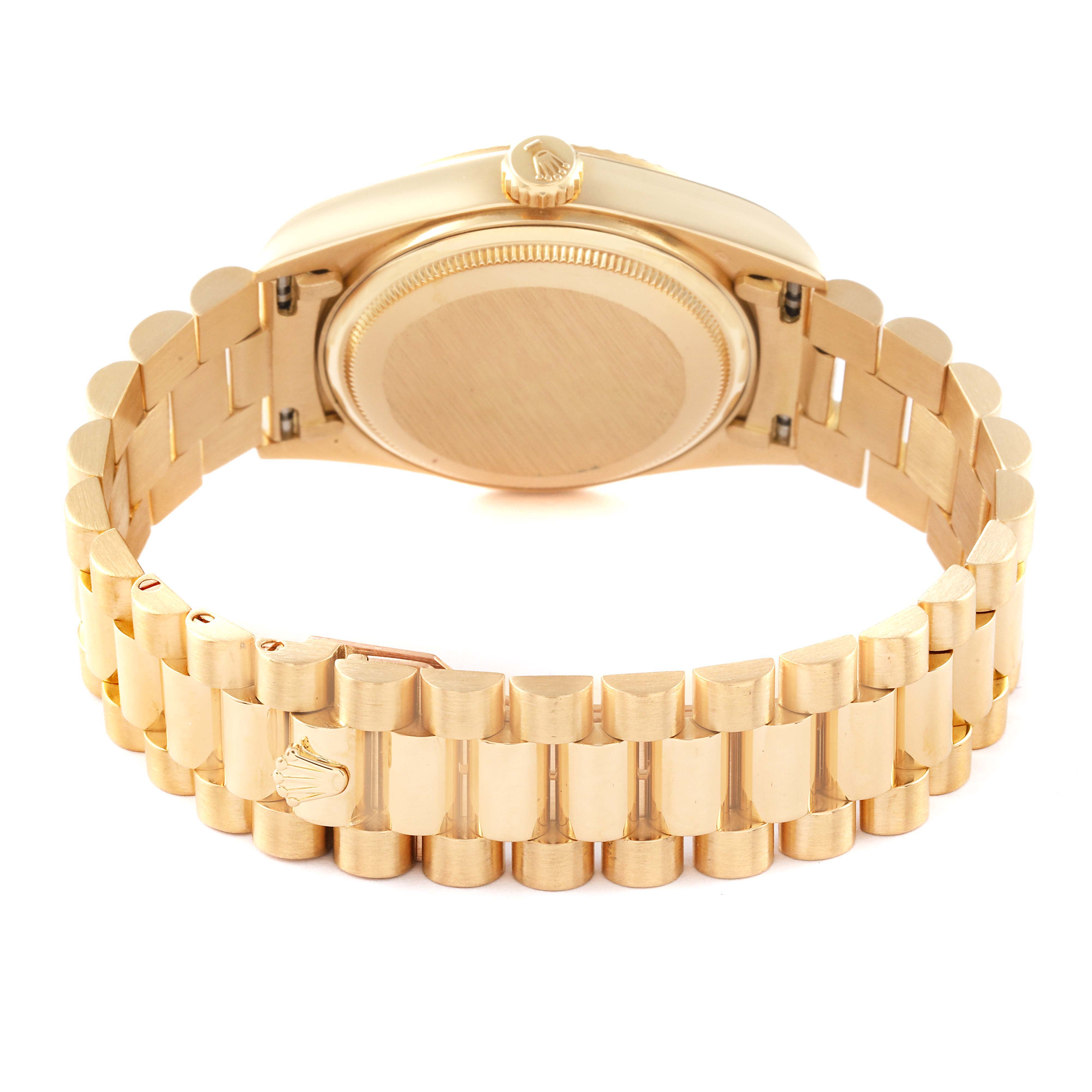 The Rolex President 18038 Men
s Yellow Gold Champagne Dial 18038 Men
s Yellow Gold Champagne Dial model watch is shown from the back, highlighting the bracelet and caseback.