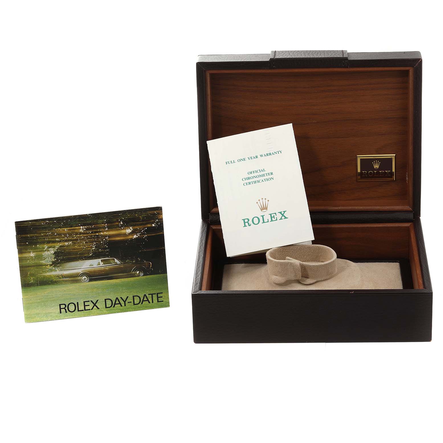 This Rolex President 18038 Men
s Yellow Gold Champagne Dial 18038 Men
s Yellow Gold Champagne Dial model set includes a wooden box, warranty paper, and a Rolex Day-Date booklet, all displayed from the front angle.