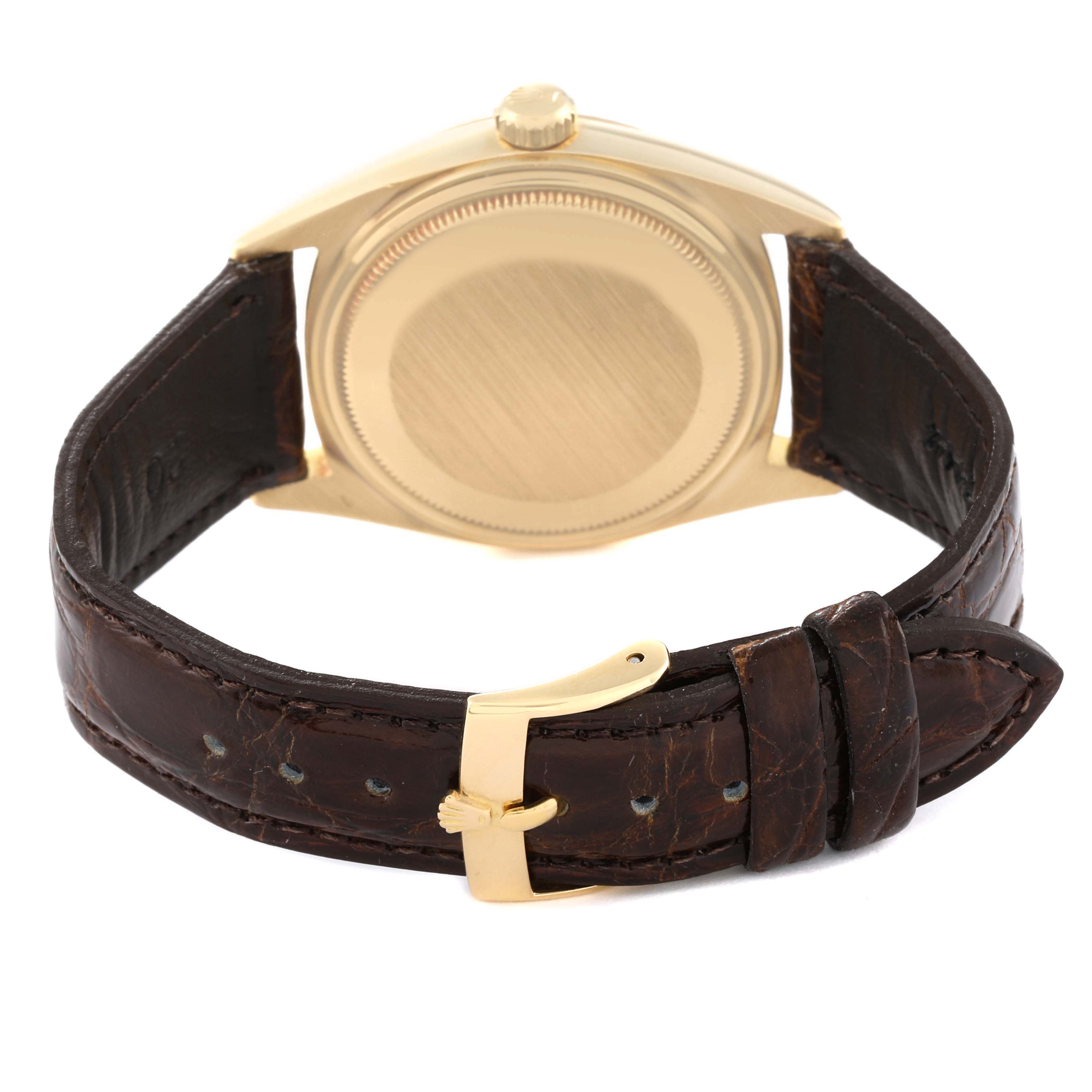 The image shows the back view of a Vintage Collection Rolex watch, highlighting its leather strap and clasp.