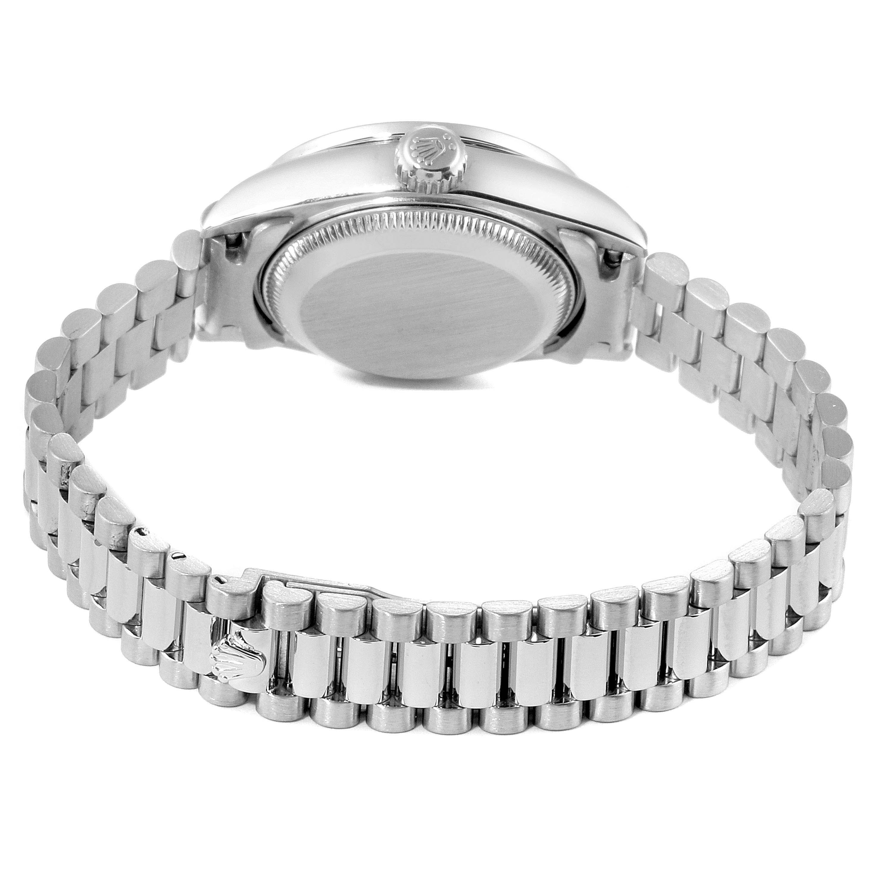 The image shows the back case and bracelet of a Rolex President 79159 Women
s White Gold Champagne Dial 79159 Women
s White Gold Champagne Dial model watch from a rear angle.