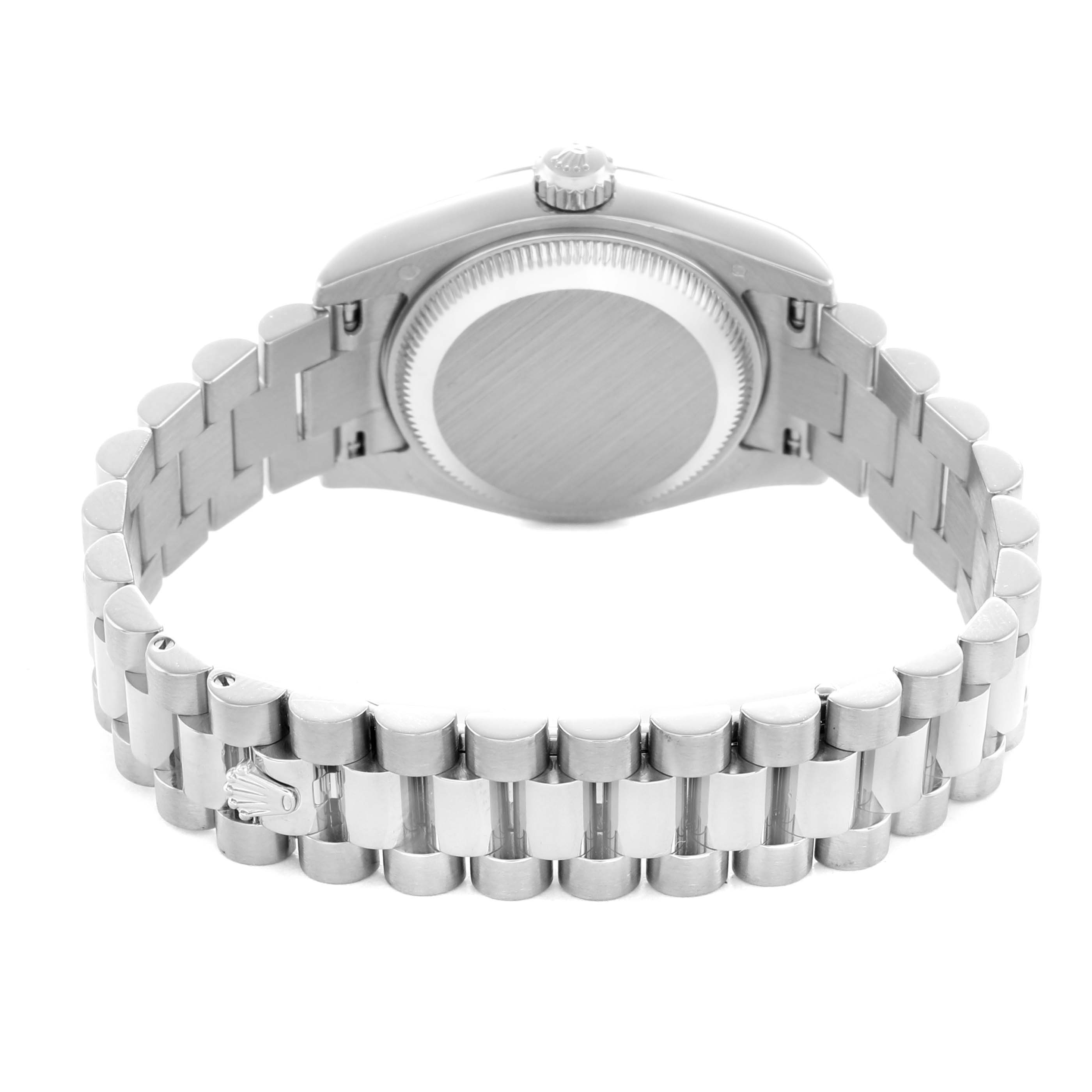 The image shows the back view of a Rolex President 179179 Women
s White Gold Silver Dial model watch, highlighting the case back and bracelet.