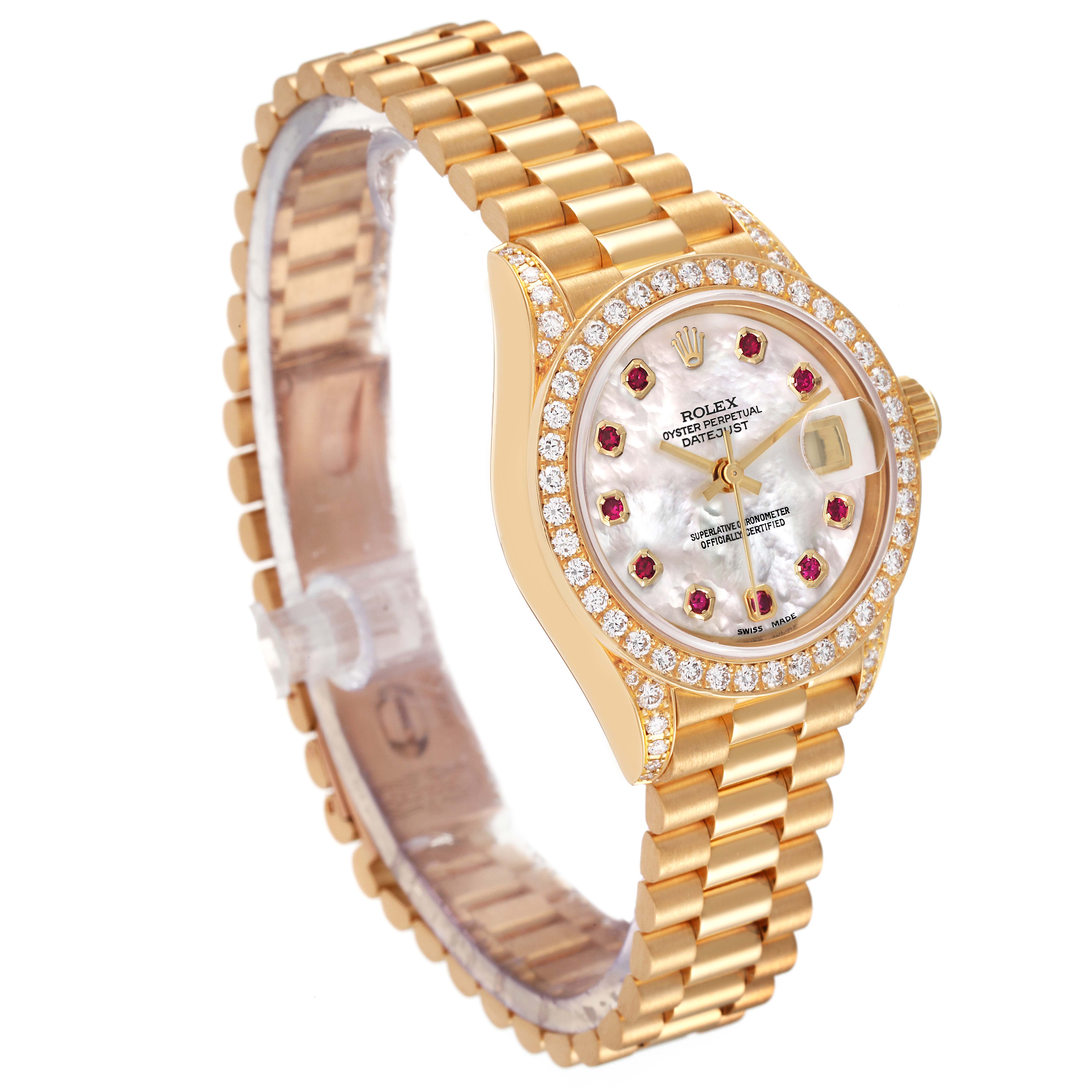 The image shows a Rolex President 69158 Women's Yellow Gold Mother of Pearl Dial 69158 Women's Yellow Gold Mother of Pearl Dial watch from an angled view highlighting the bracelet, bezel, dial, and crown.