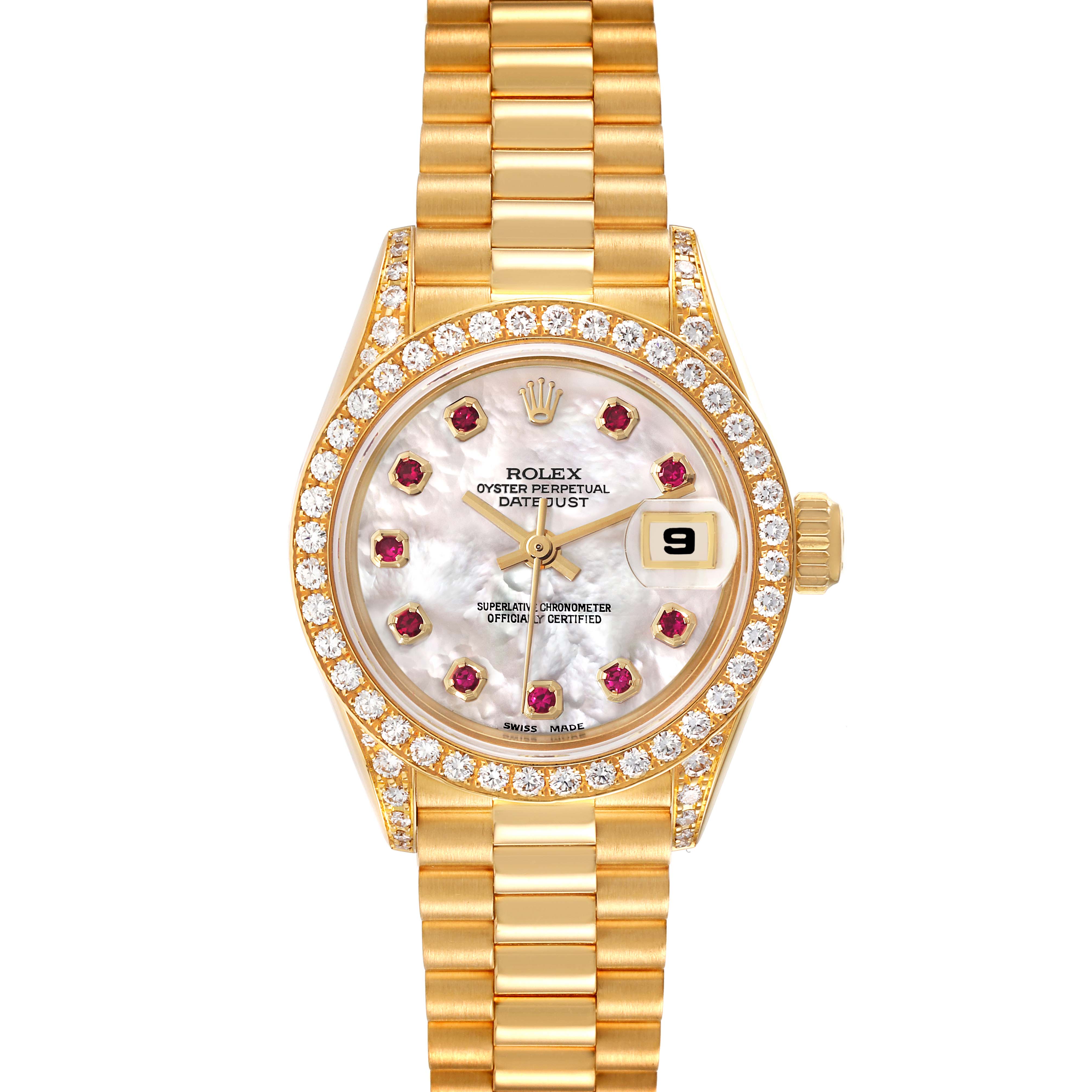 The image shows a frontal view of a Rolex President 69158 Women's Yellow Gold Mother of Pearl Dial 69158 Women's Yellow Gold Mother of Pearl Dial model watch with a gold bracelet, diamond bezel, and ruby hour markers.