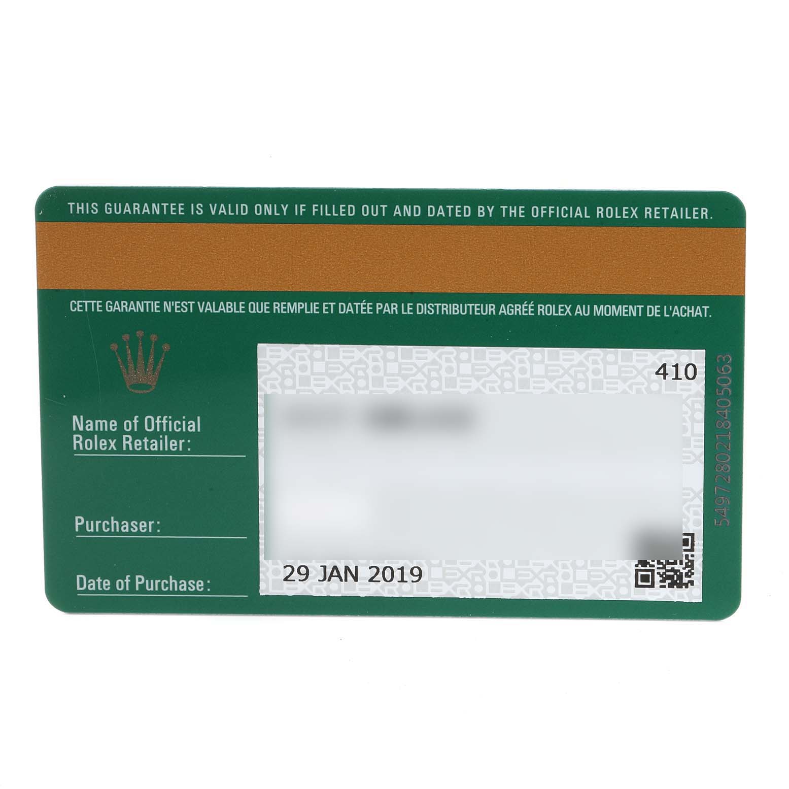 This image shows the official Rolex guarantee card for the Sea-Dweller model, with the date of purchase and retailer details.