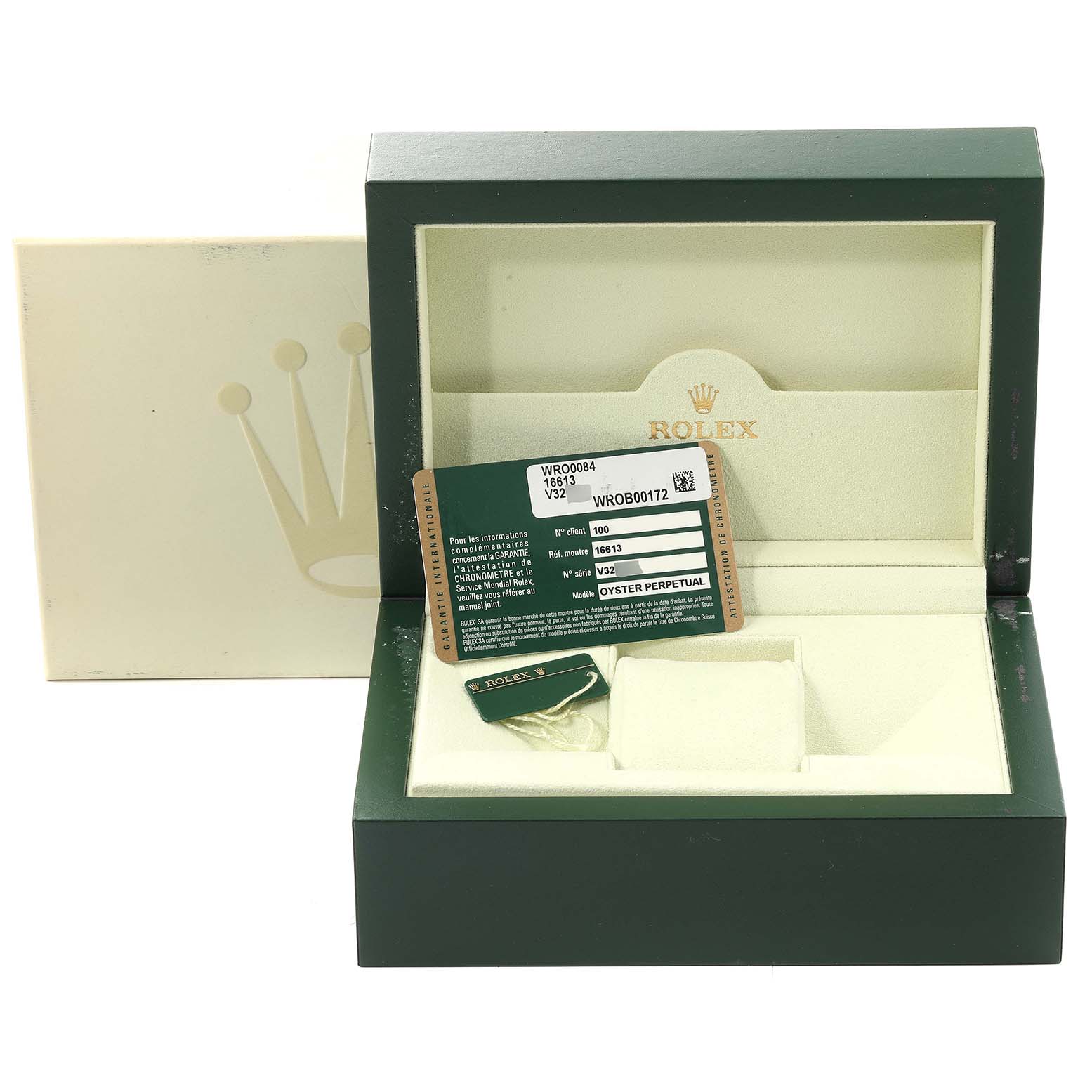 This image shows the Rolex Submariner 16613 Men's Steel and Gold (two tone) Blue Dial 16613 Men's Steel and Gold (two tone) Blue Dial box with its warranty card and accessories from a slightly elevated front angle.