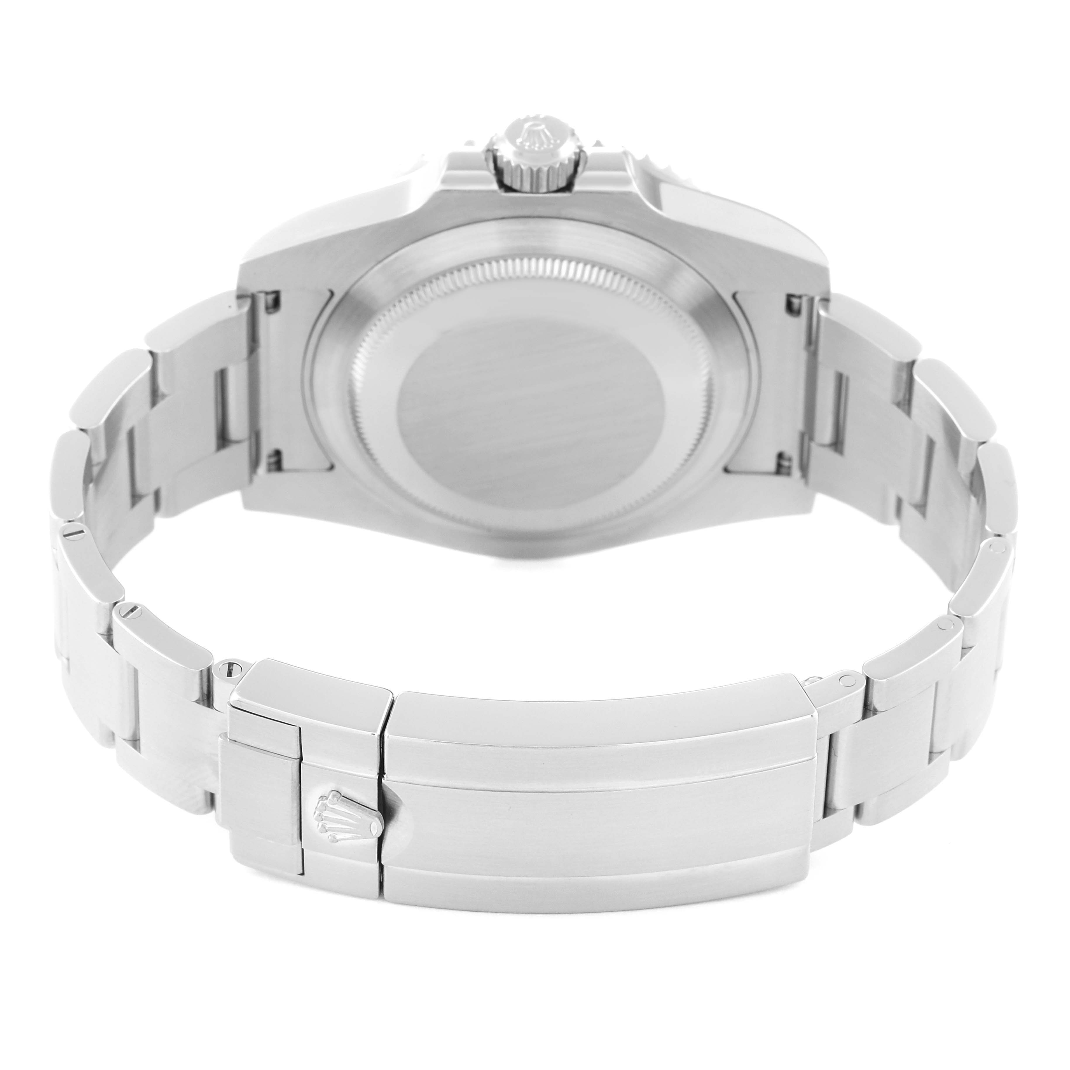 The image shows the back case and bracelet clasp of a Rolex Submariner 116610LV Men
s Stainless Steel Green Dial 116610LV Men
s Stainless Steel Green Dial watch from a rear angle.